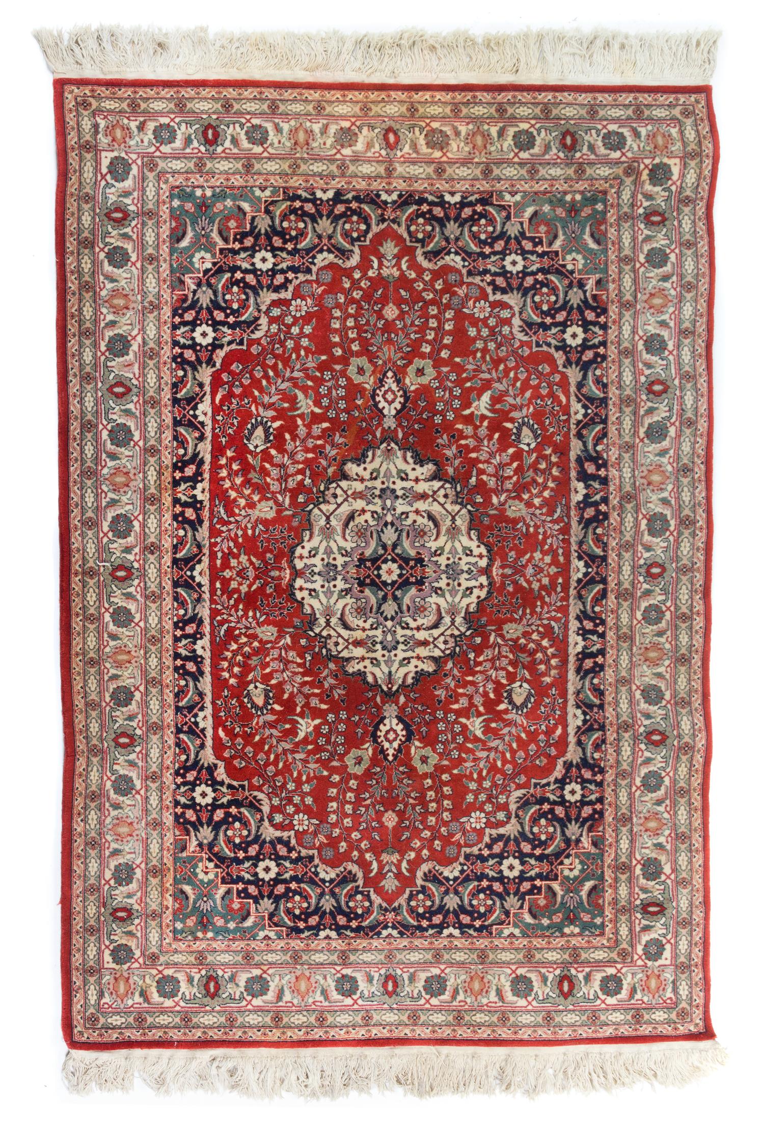 A Persian Wool Rug 6 feet 1 1/5 inches x 4 feet 1 1/2 inches.