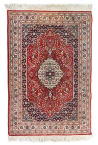 A Persian Wool Rug 6 feet 1 1/5 inches x 4 feet 1 1/2 inches.