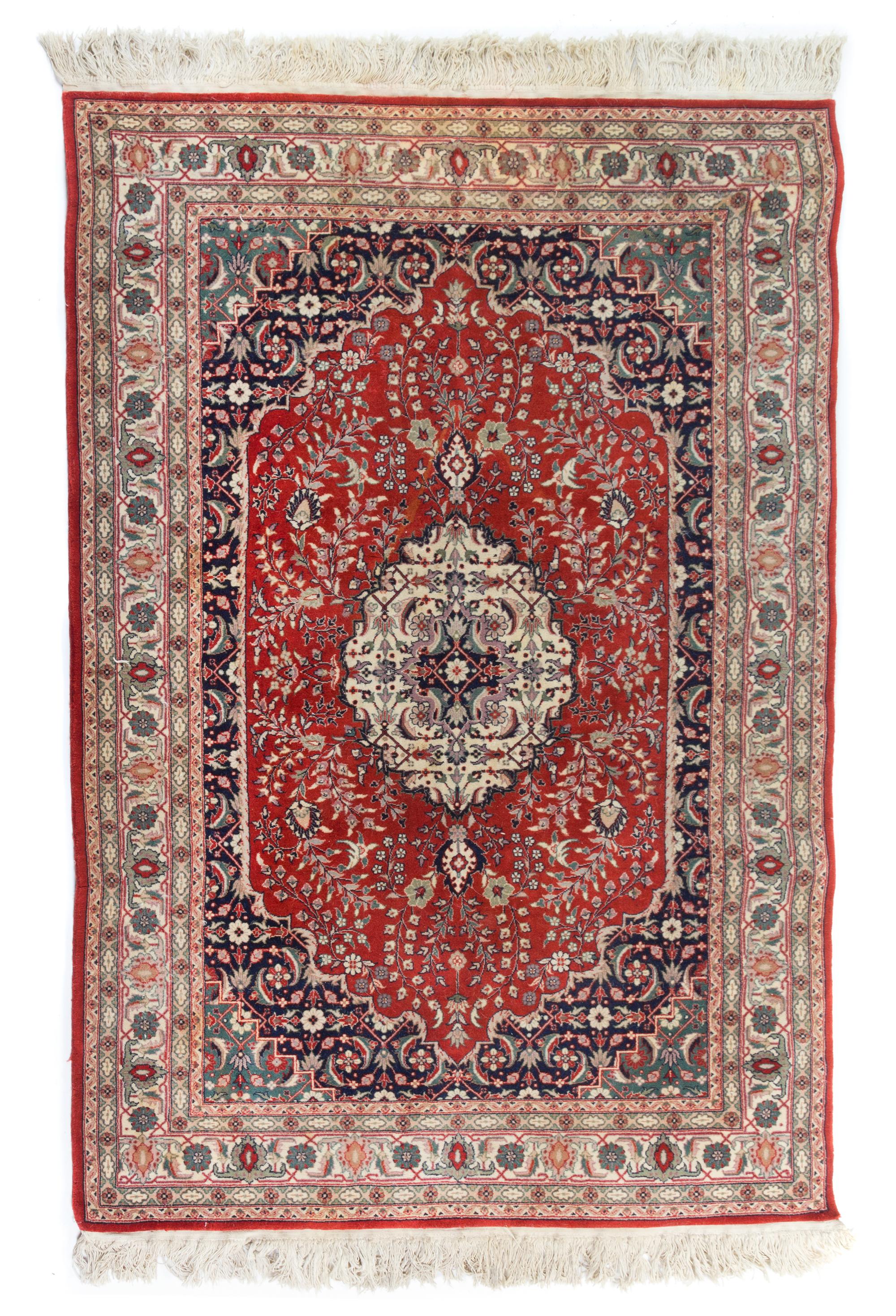 A Persian Wool Rug 6 feet 1 1/5 inches x 4 feet 1 1/2 inches.