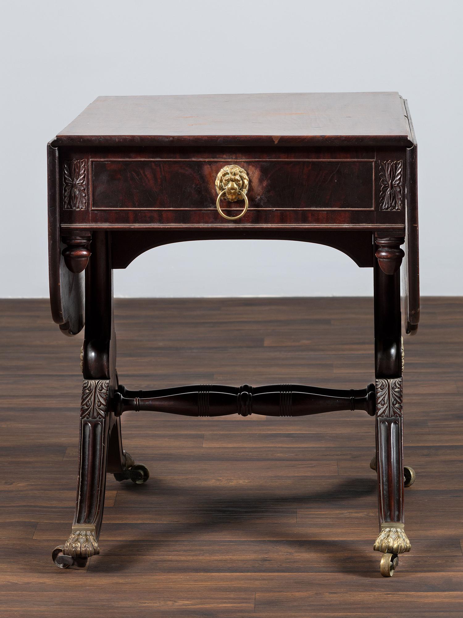 A Classical Brass-Mounted Walnut and Mahogany Pembroke Table