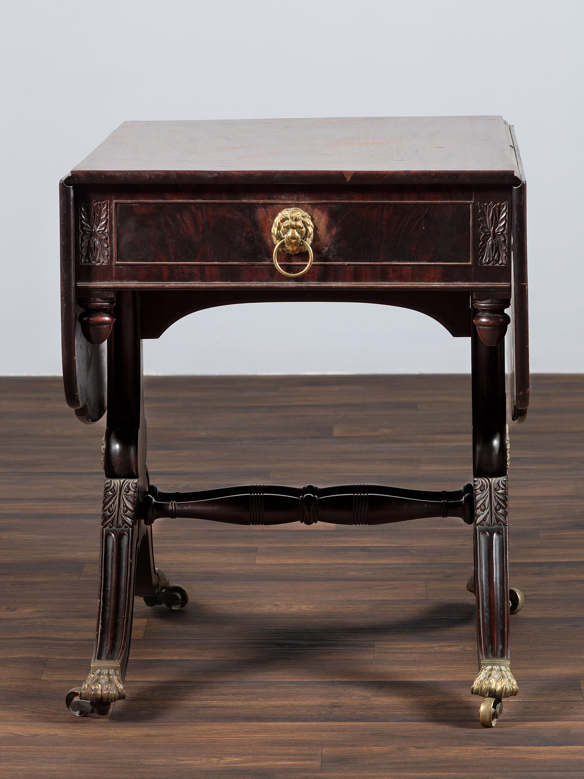 A Classical Brass-Mounted Walnut and Mahogany Pembroke Table