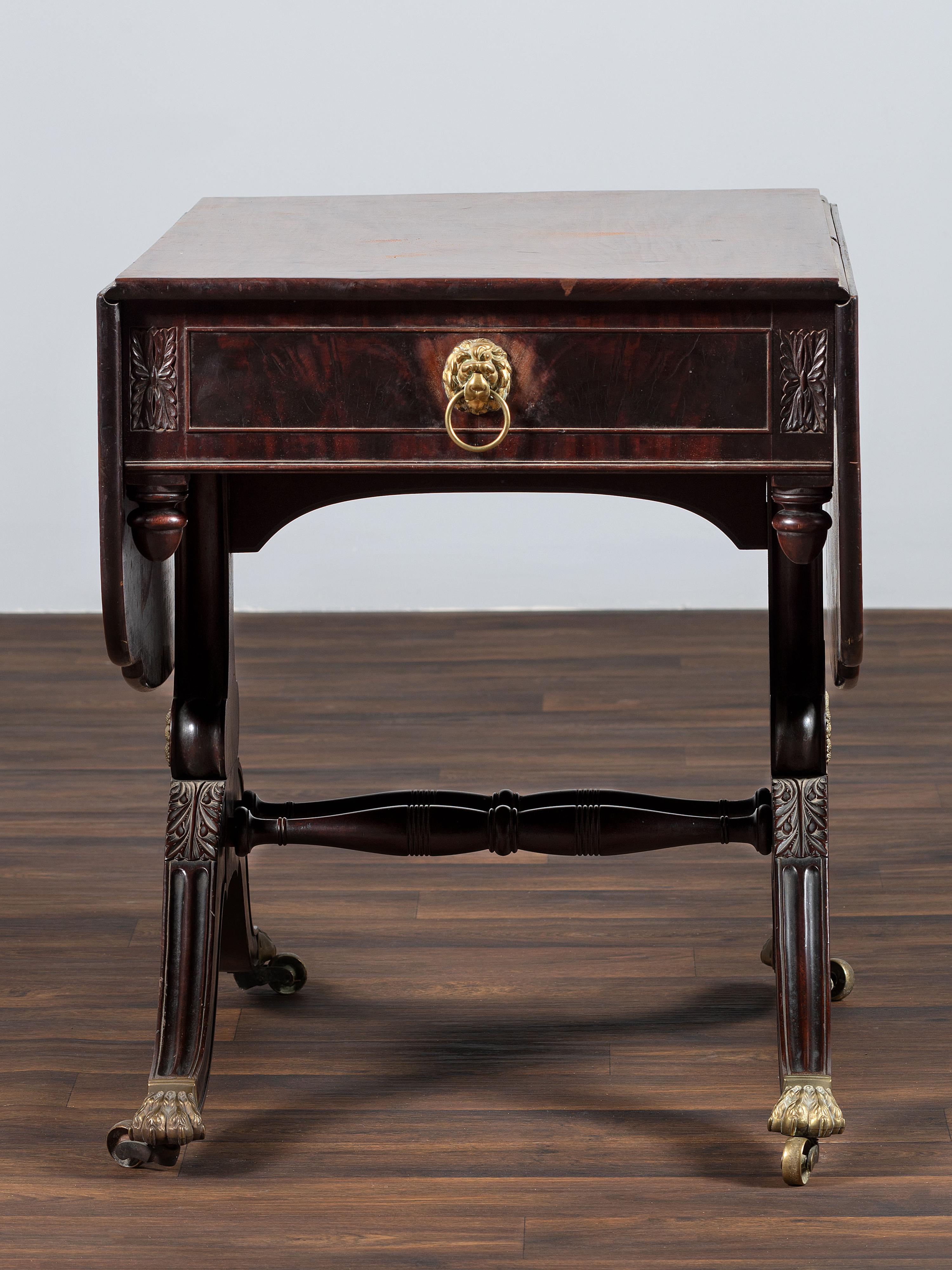 A Classical Brass-Mounted Walnut and Mahogany Pembroke Table