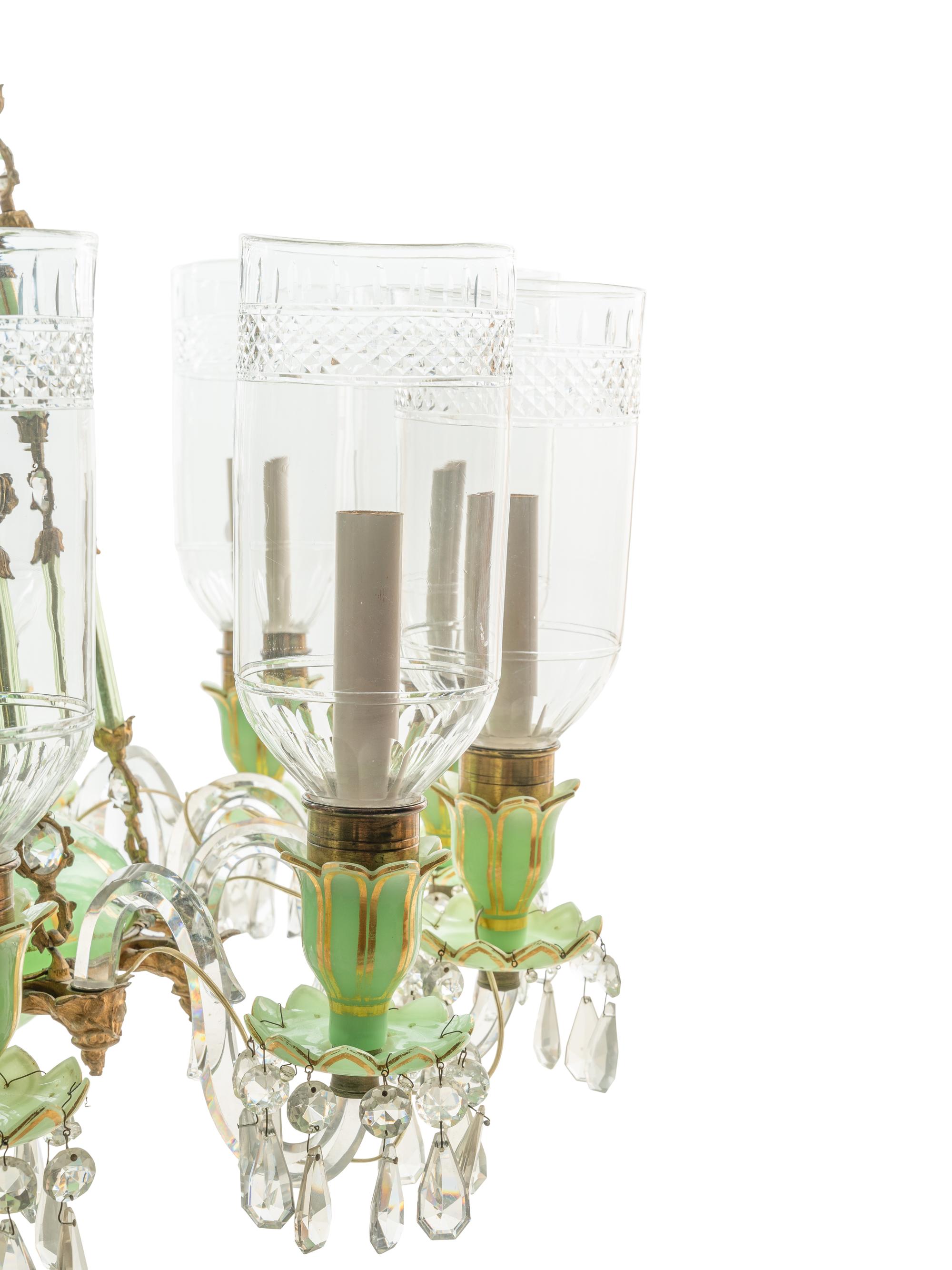 A French Opaline Glass and Gilt Bronze Twelve-Light Chandelier with Cut Glass Hurricane Shades