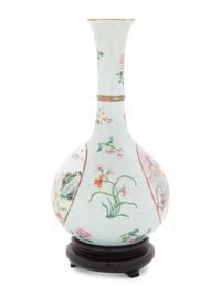 A Sgraffito Ground Famille Rose Porcelain Bottle Vase