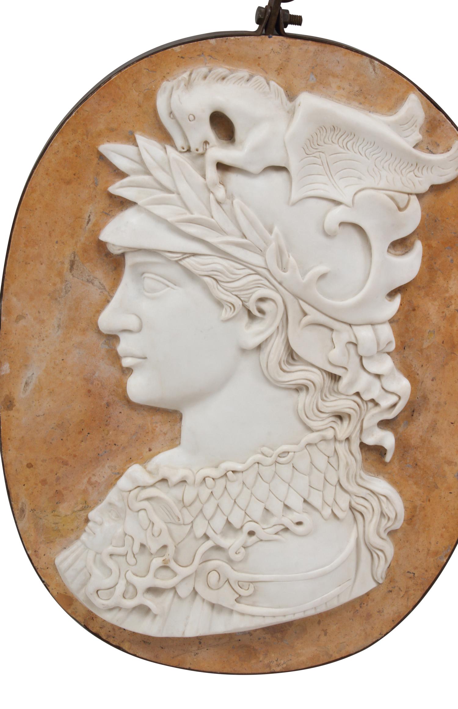 A Set of Four Carved Marble and Iron Mounted Profile Plaques