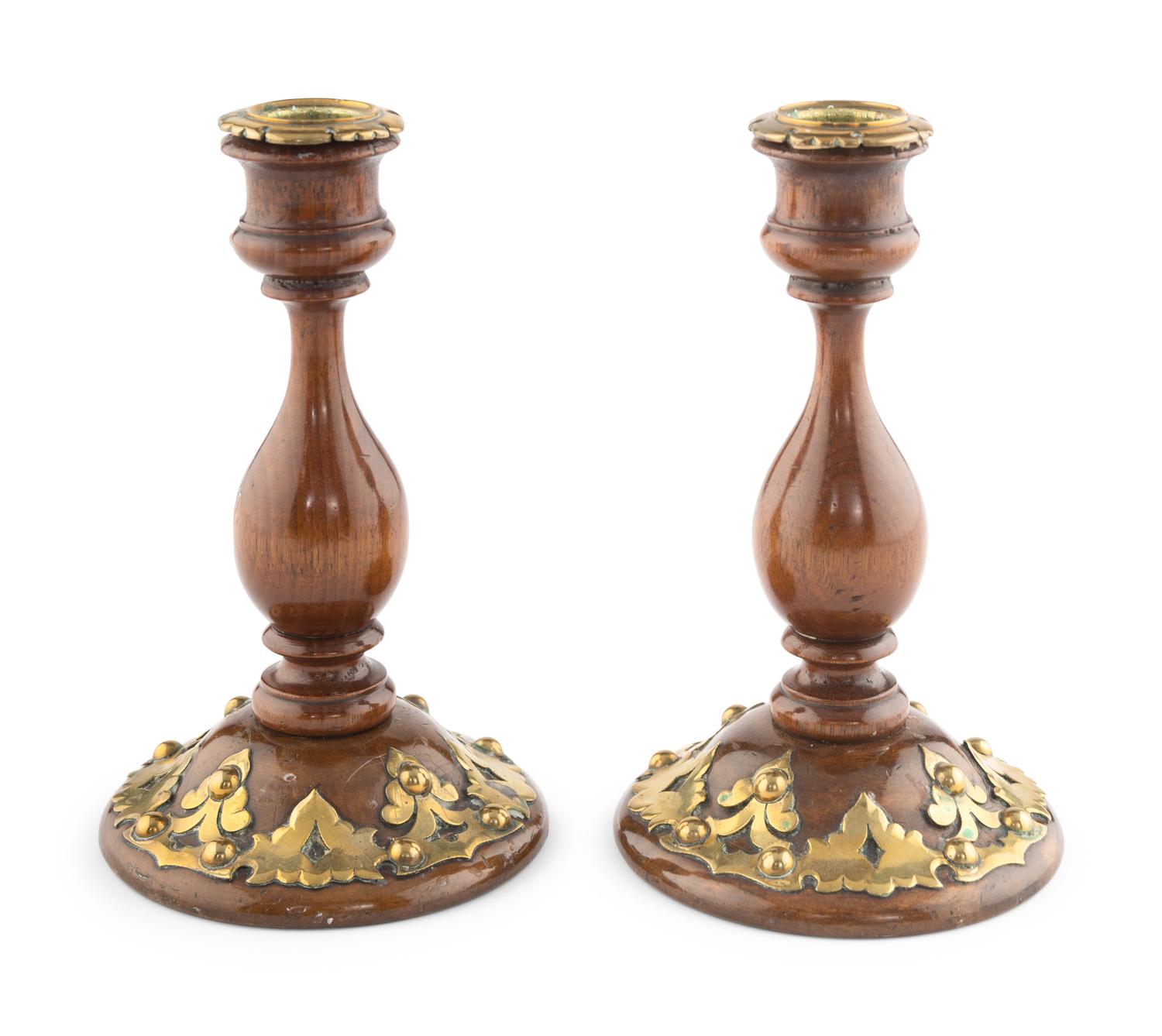 A Pair of Victorian Brass and Walnut Candlesticks