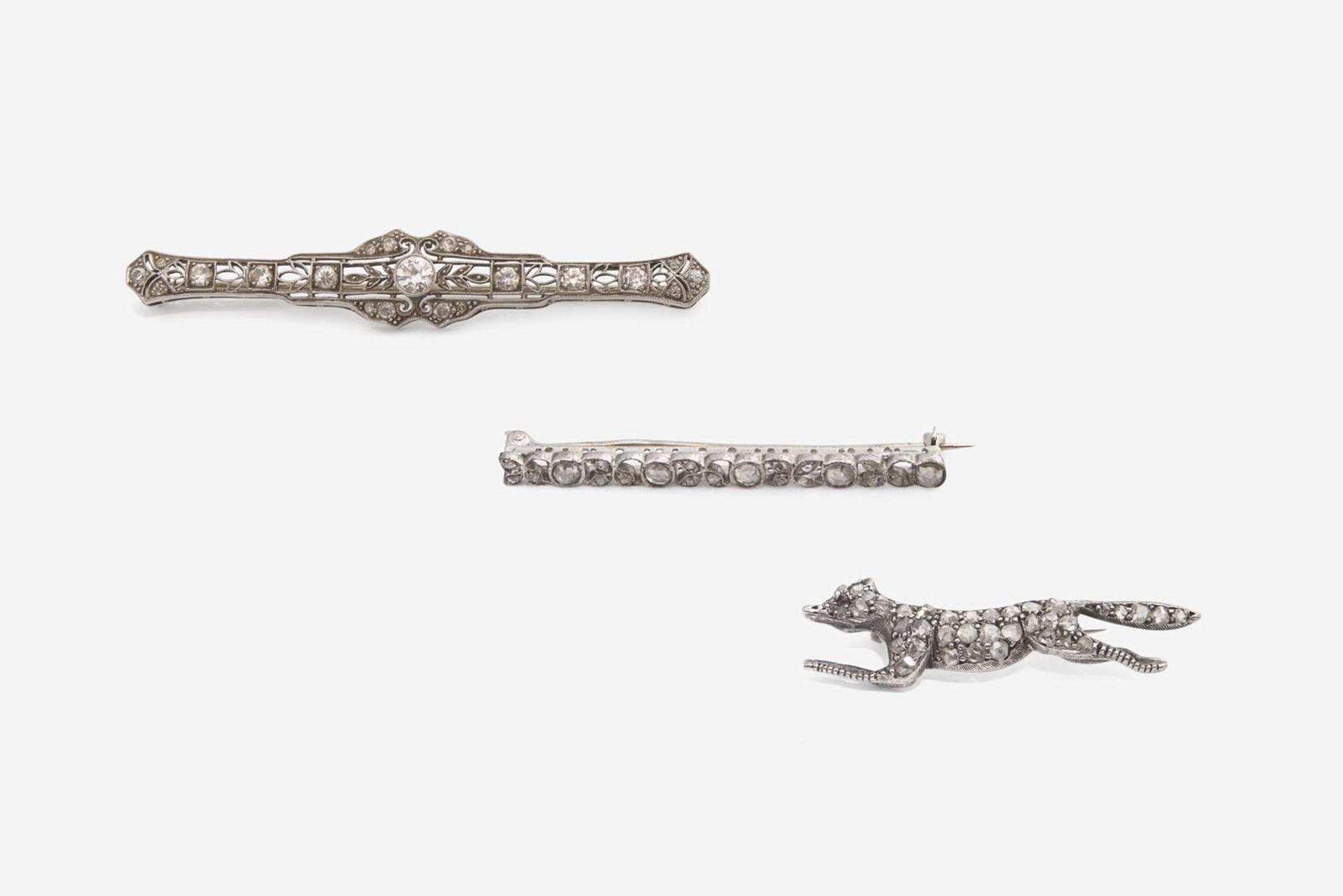 A Group of Three 14K White Gold and Diamond Pins