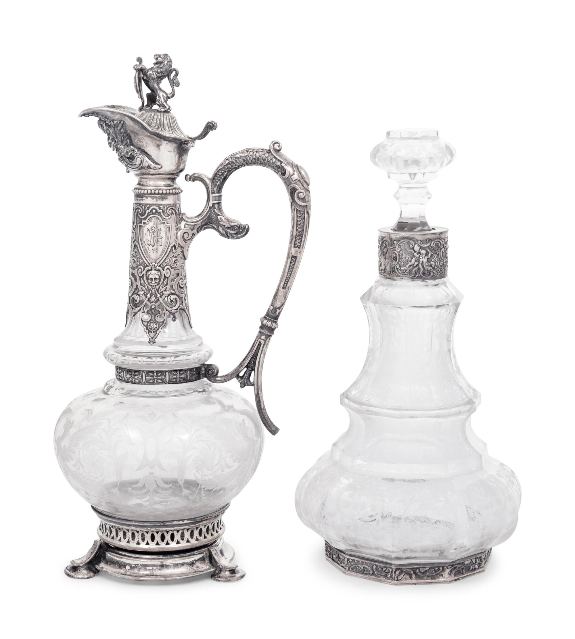 A Continental Silver Mounted Etched Glass Decanter and an English Silver-Plate Mounted Etched Glass Claret Jug
