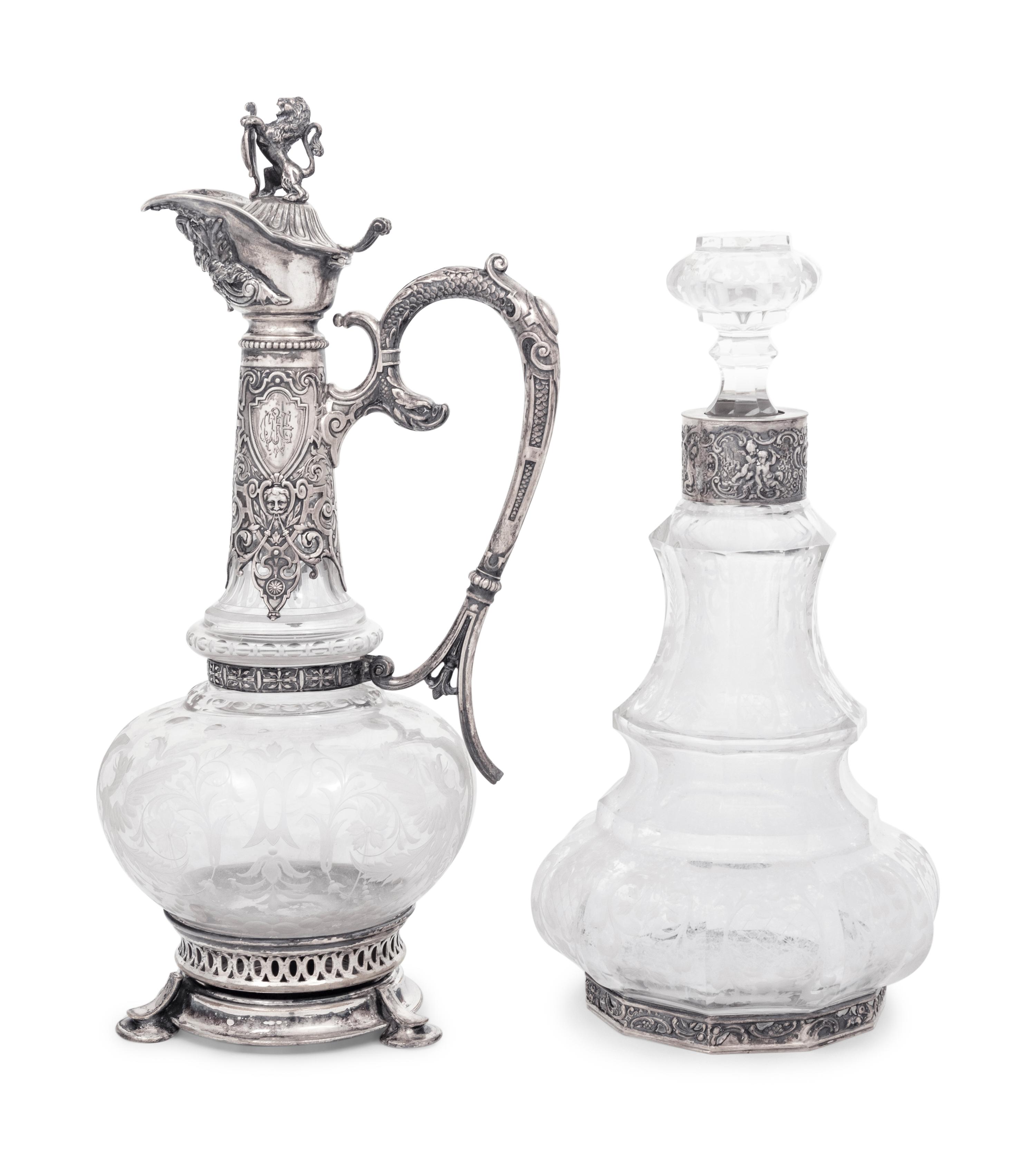 A Continental Silver Mounted Etched Glass Decanter and an English Silver-Plate Mounted Etched Glass Claret Jug