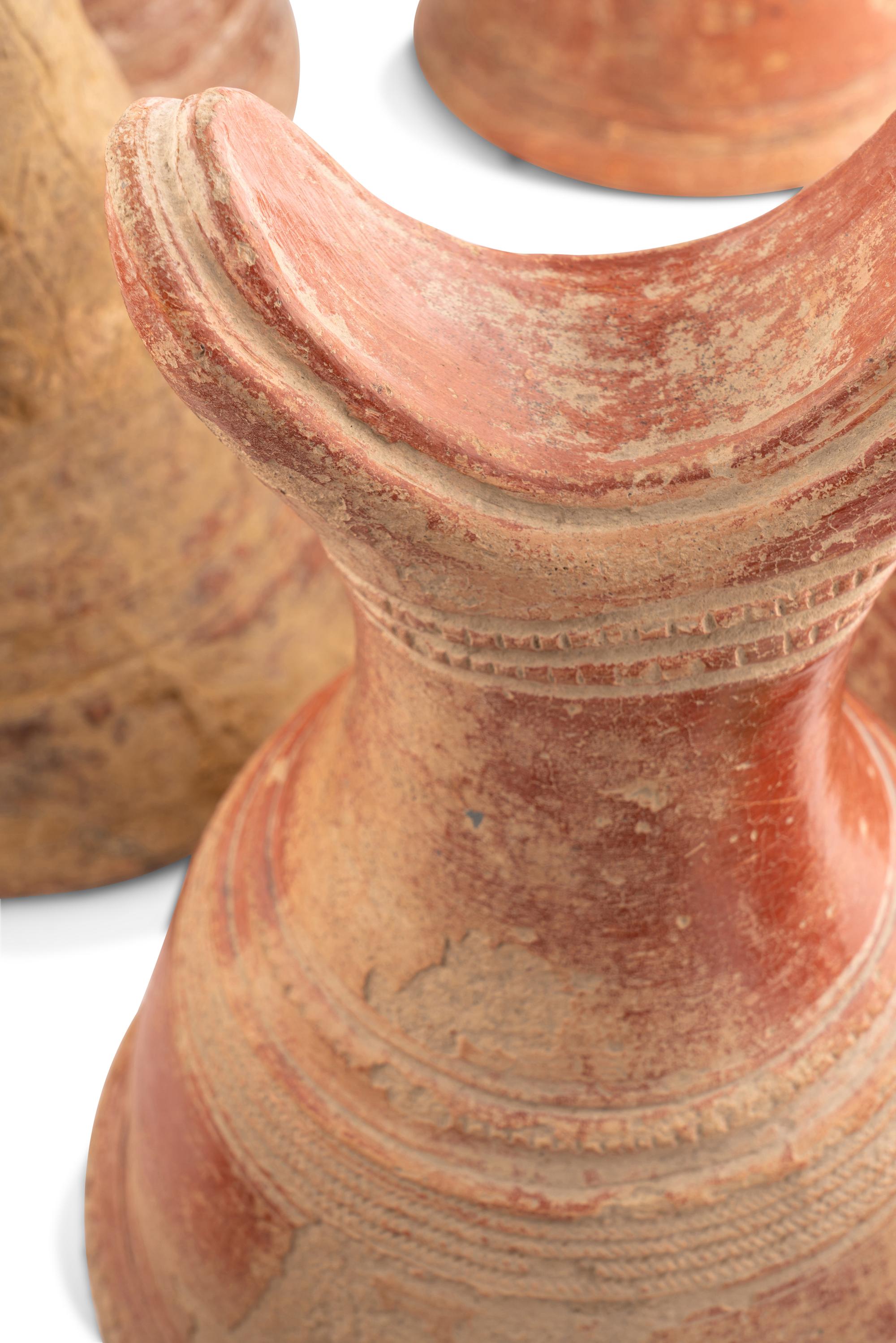 A Collection of Fourteen African Ceramic Headrests