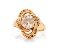 A 14 Karat Yellow Gold and Diamond Ring,