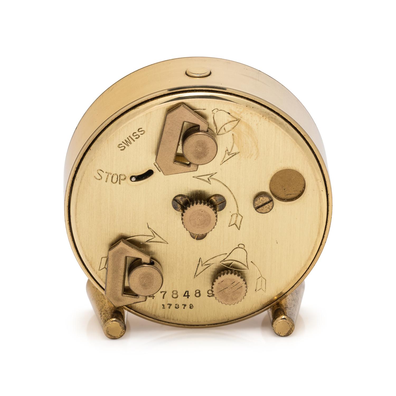 CARTIER, GILT-METAL TRAVEL ALARM CLOCK