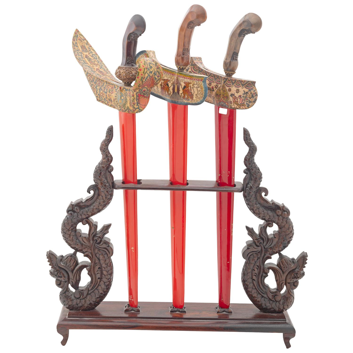 Three Decorative Javanese Kris Knives with Display Stand