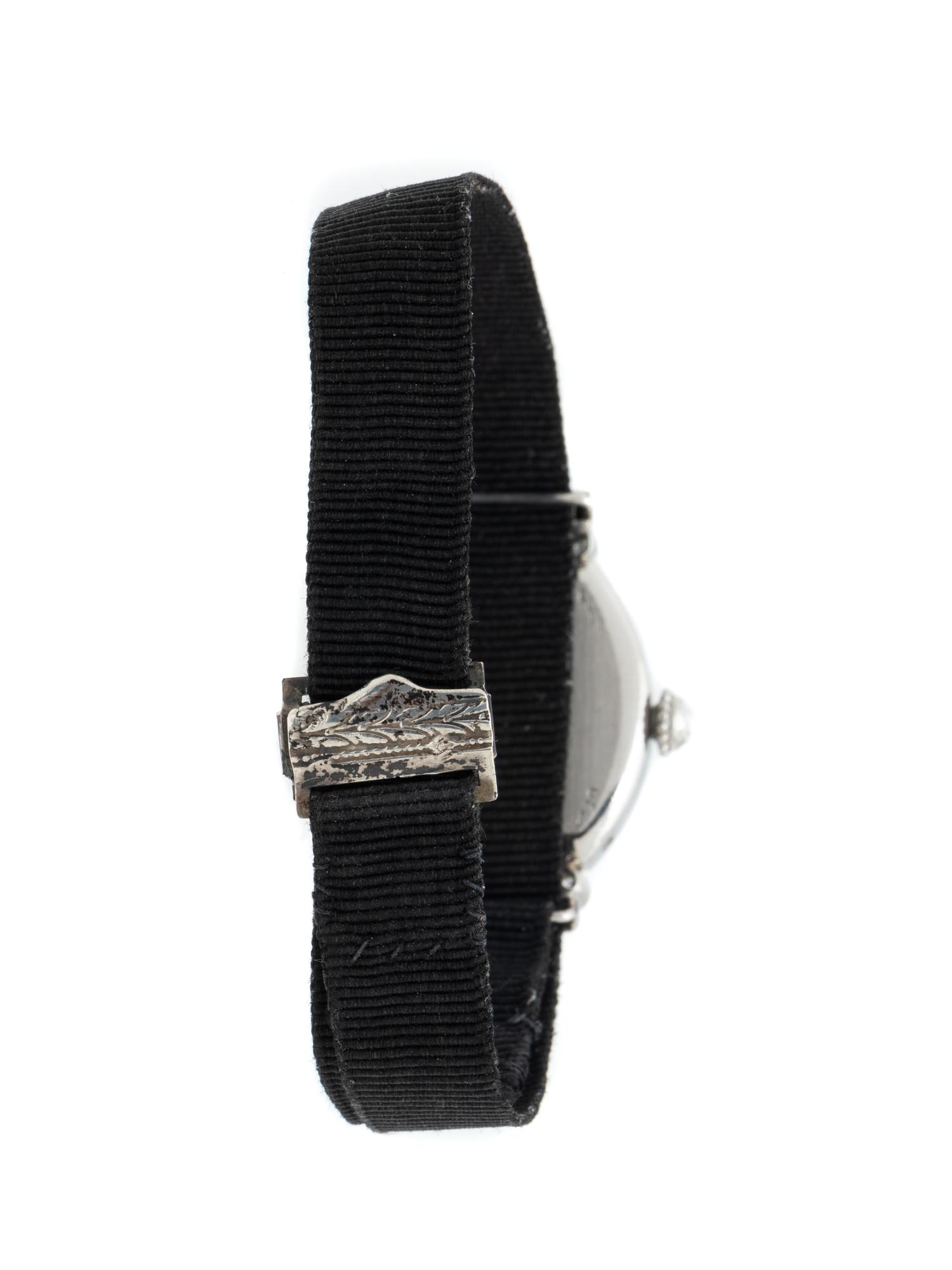 CARTIER PARIS, ART DECO, DIAMOND AND PLATINUM WATCH
