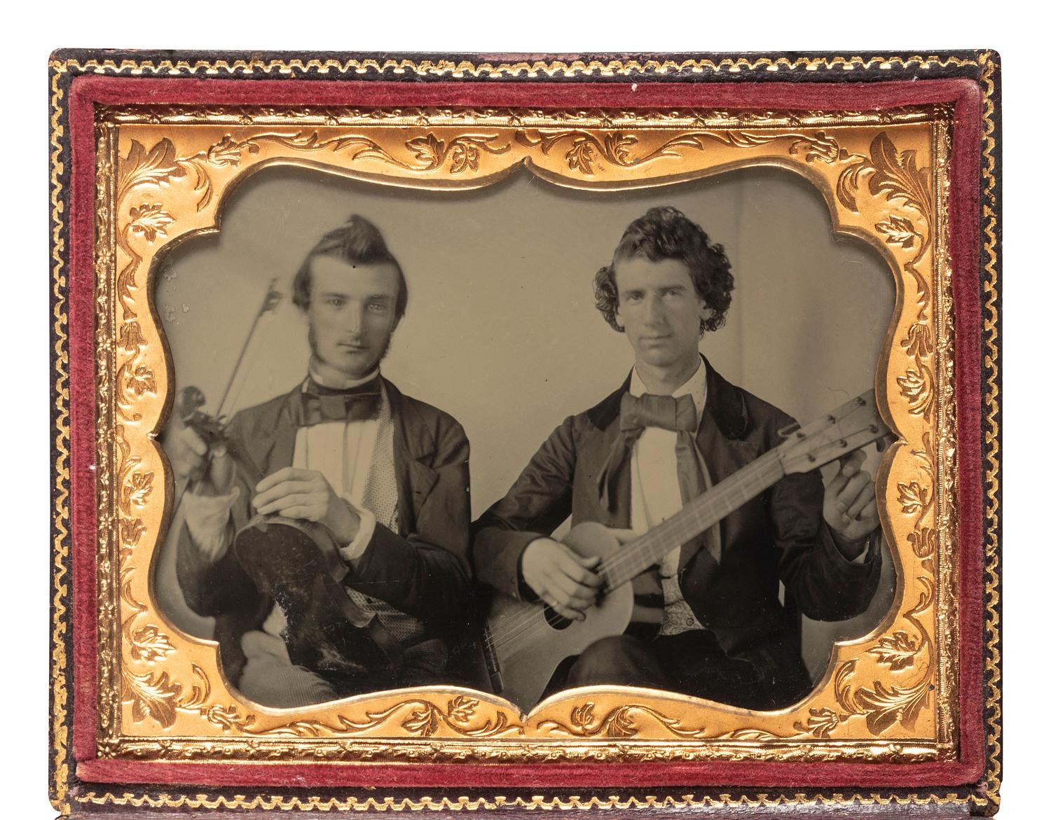 [EARLY PHOTOGRAPHY]. Quarter plate ambrotype portrait of two musicians, tentatively identified.