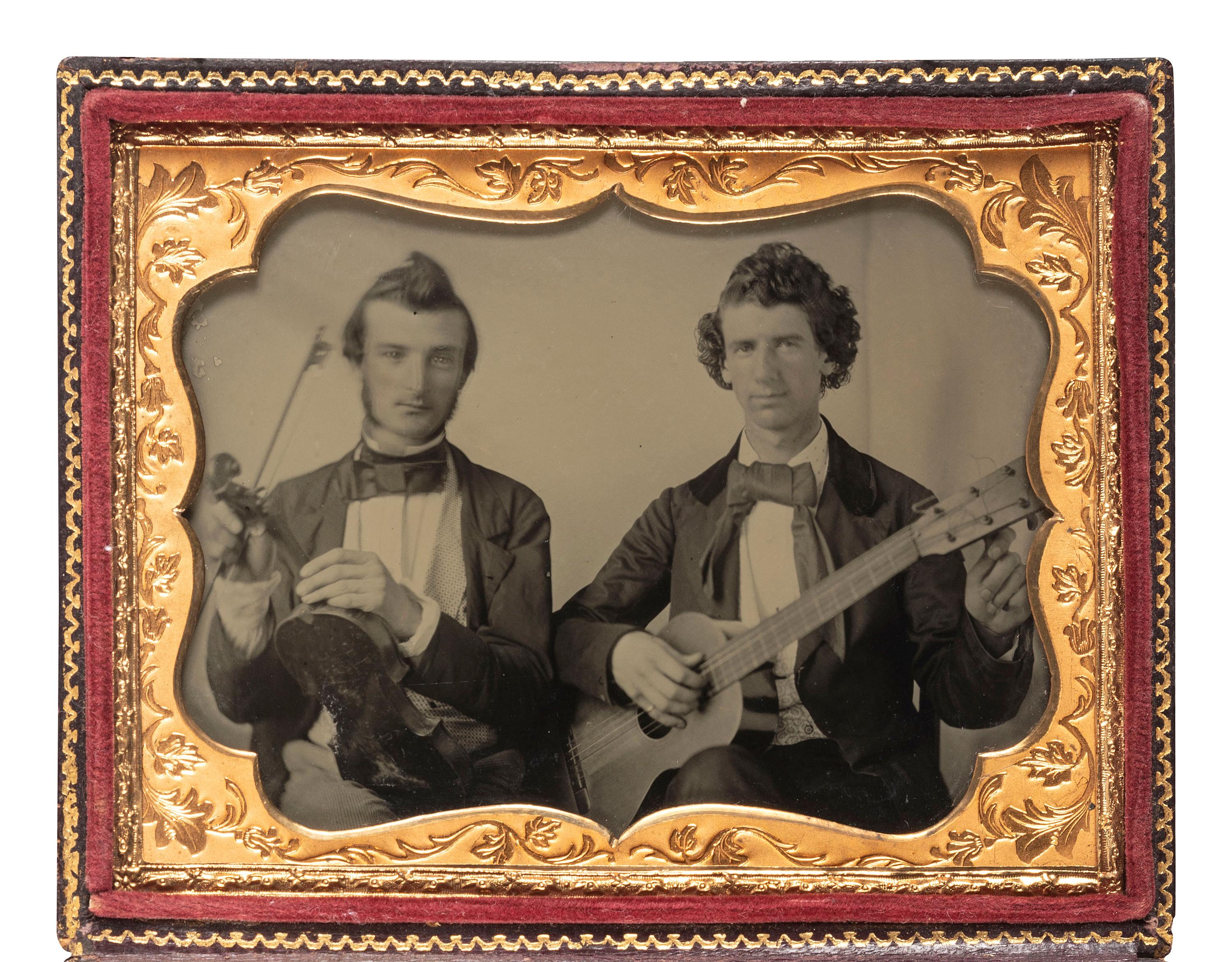 [EARLY PHOTOGRAPHY]. Quarter plate ambrotype portrait of two musicians, tentatively identified.