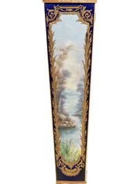 A Pair of Sèvres Style Gilt Bronze Mounted Painted and Parcel Gilt Porcelain and Onyx Pedestals
