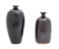 Two Chinese Black Glazed Pottery Vases Height of taller 12 1/4 inches.
