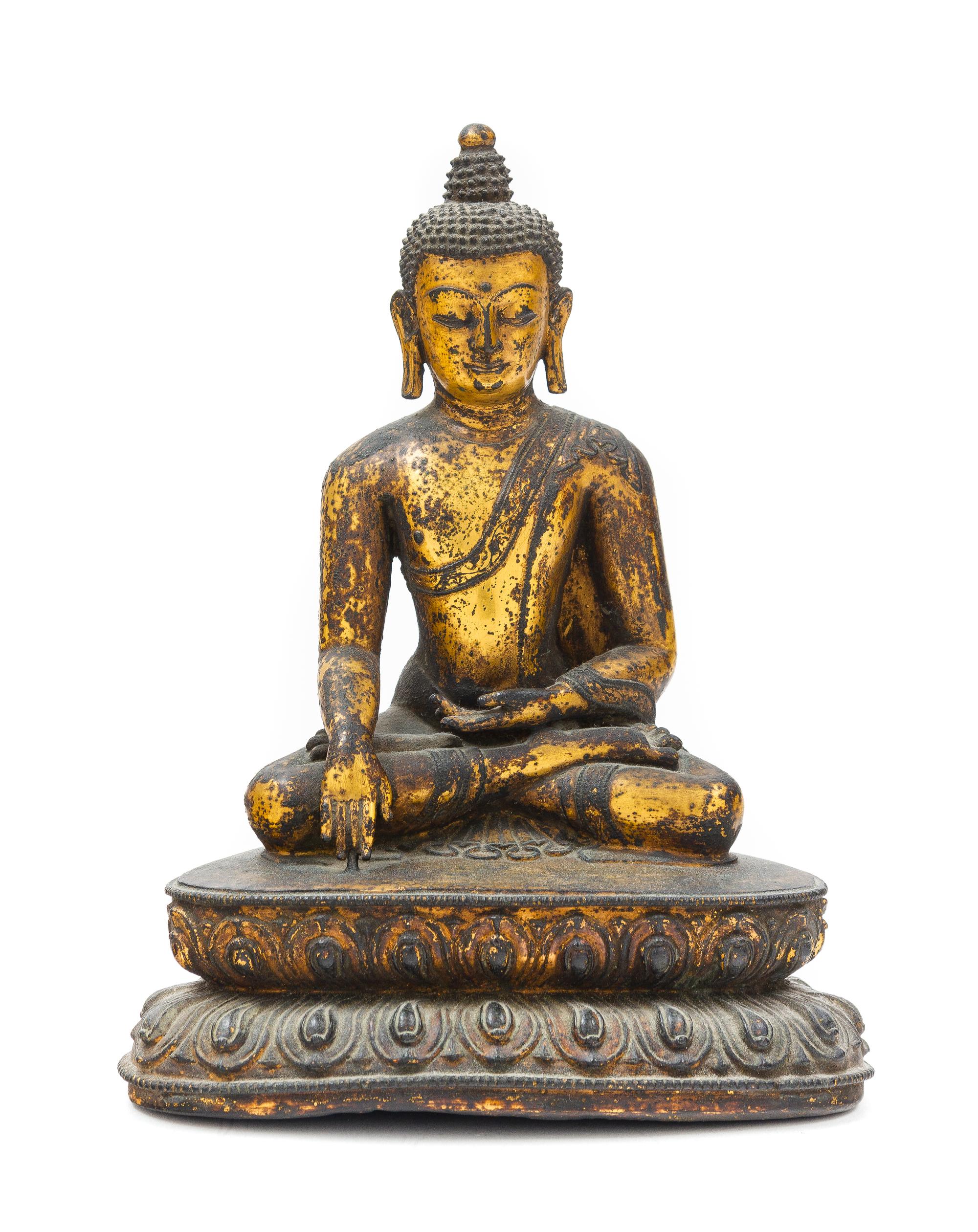 A Sino-Tibetan Gilt Bronze Figure of Buddha Shakyamuni Height 7 1/4 inches. — 18TH/19TH CENTURY