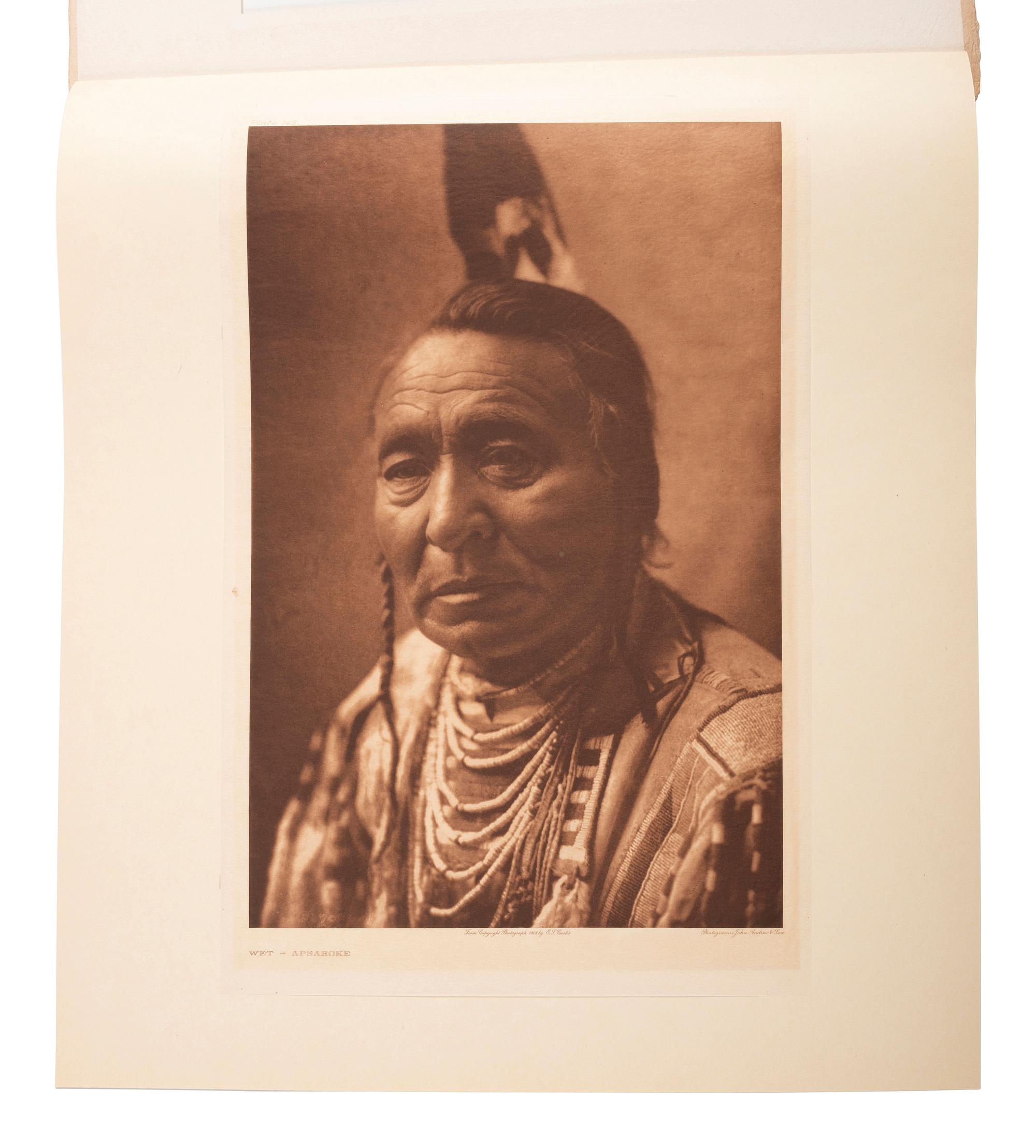 CURTIS, Edward (1868-1952). A group of 2 portfolio photogravures of Apsaroke subjects.