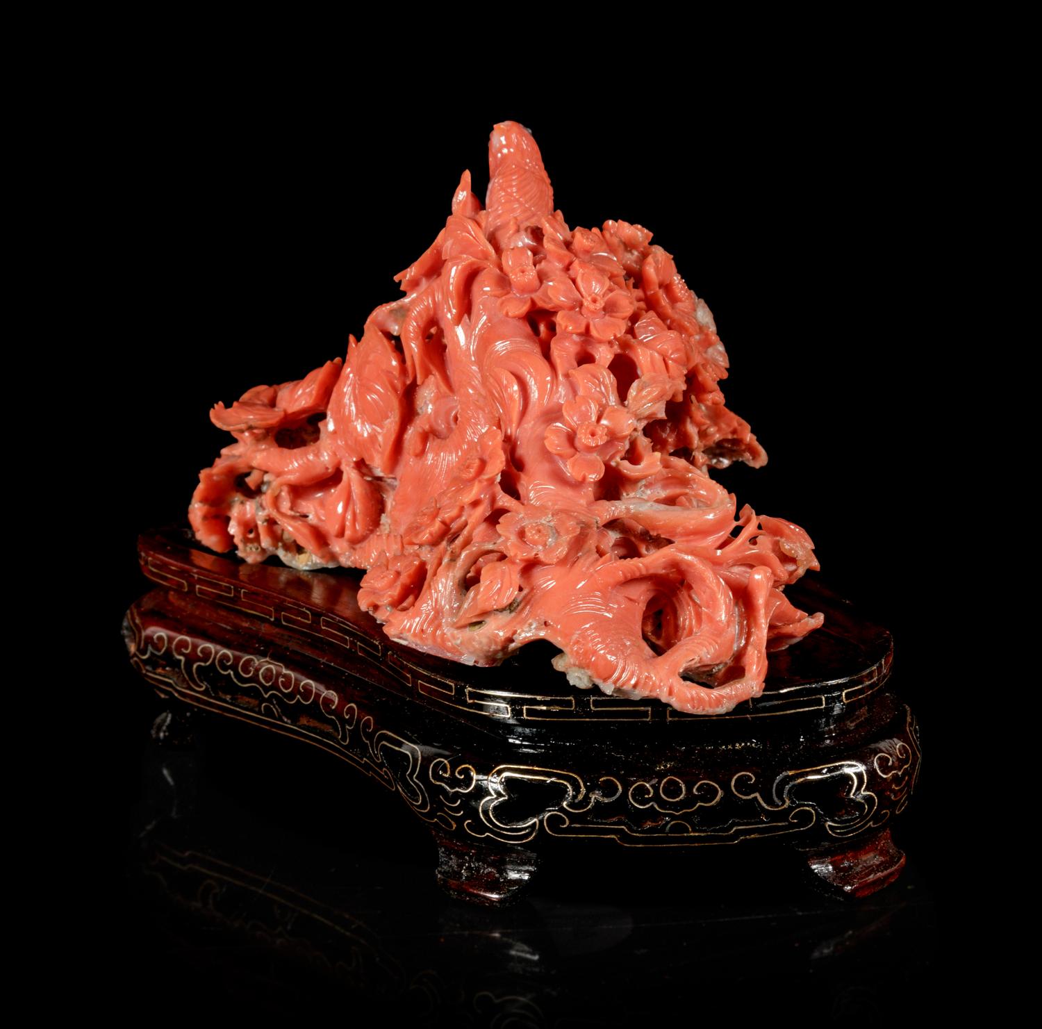 A Red Coral 'Magpie' Carving