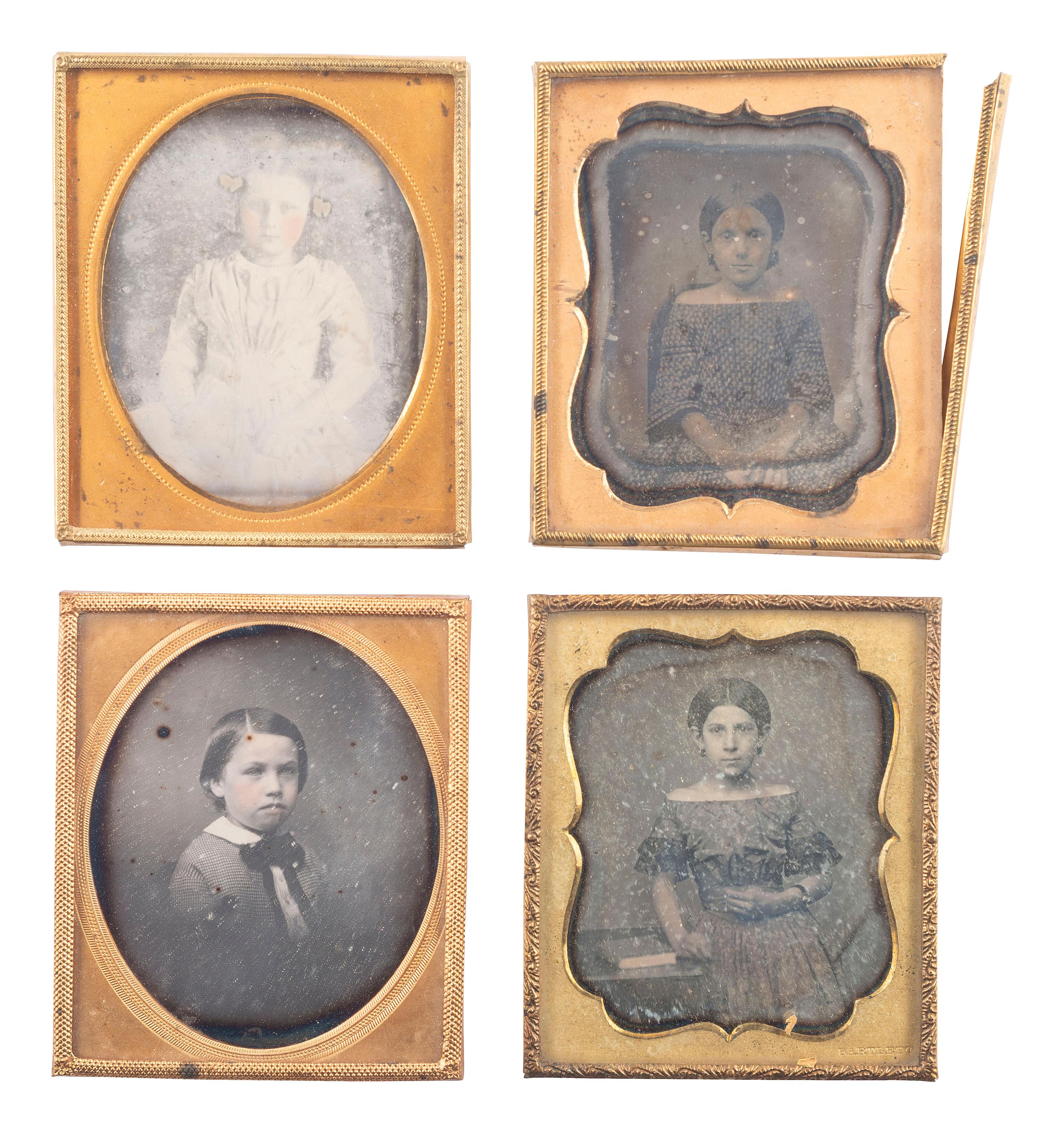 [EARLY PHOTOGRAPHY]. A group of 24 daguerreotype portraits of children and young adults, including: