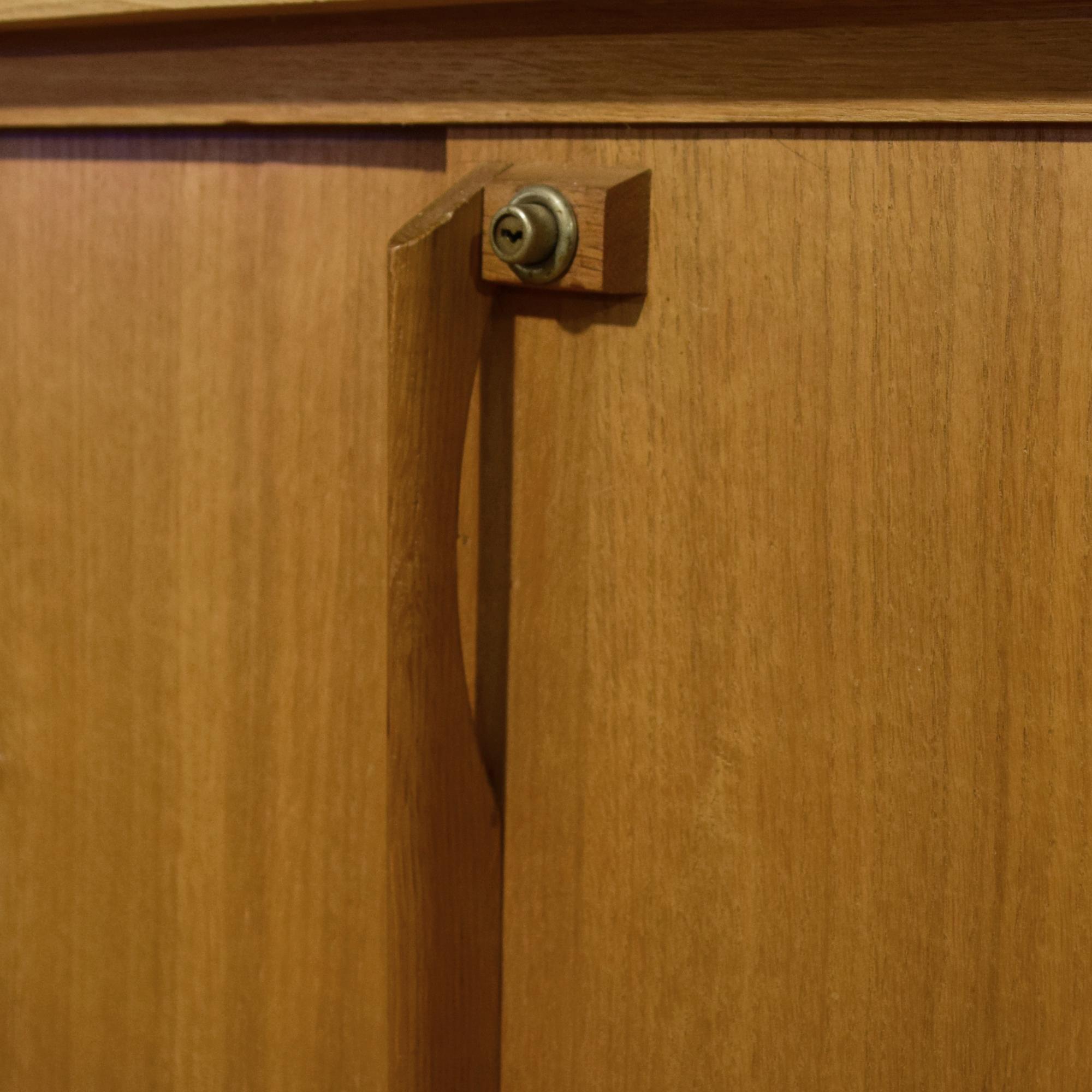 A Mid-Century Two-Tier Wood Cabinet 89" W x 17" D x 84.5" H — France, Mid-20th Century