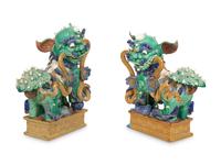 A Pair of Chinese Glazed Ceramic Foo Dogs