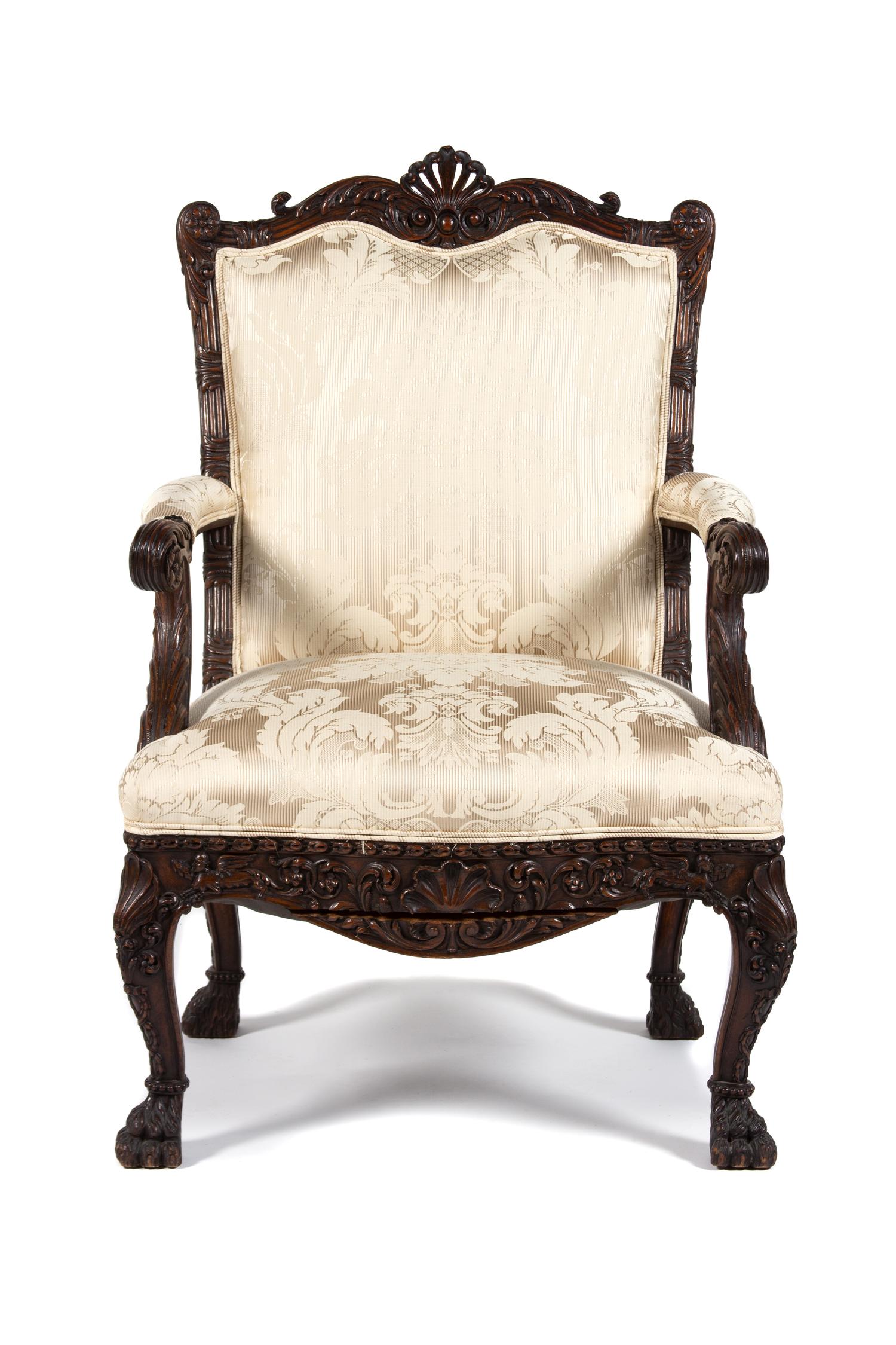 A George I Style Carved Mahogany Upholstered Open Armchair Height 40 3/4 inches. — 20TH CENTURY