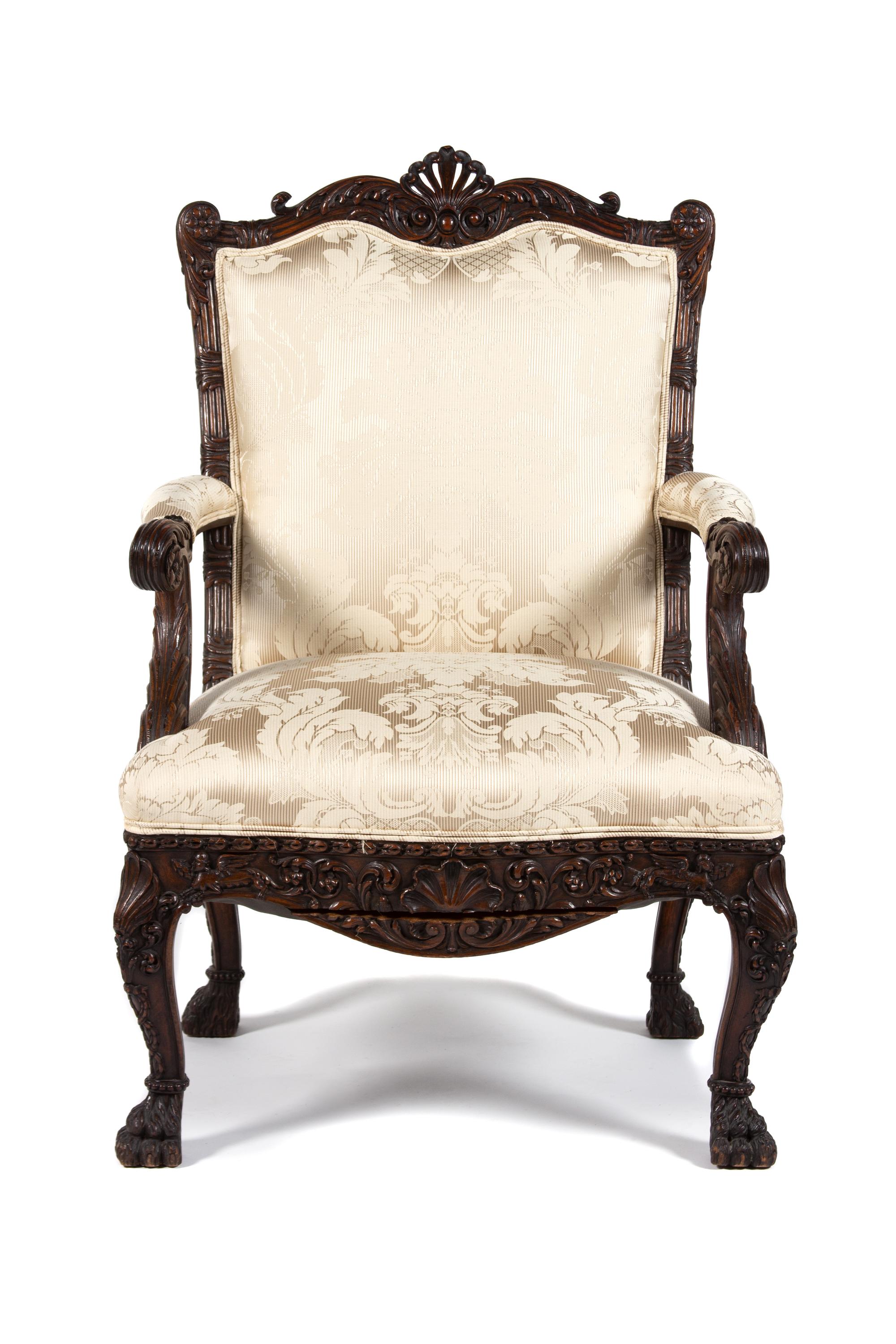 A George I Style Carved Mahogany Upholstered Open Armchair Height 40 3/4 inches. — 20TH CENTURY