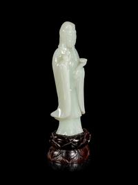 A Pale Celadon Jade Figure of Guanyin