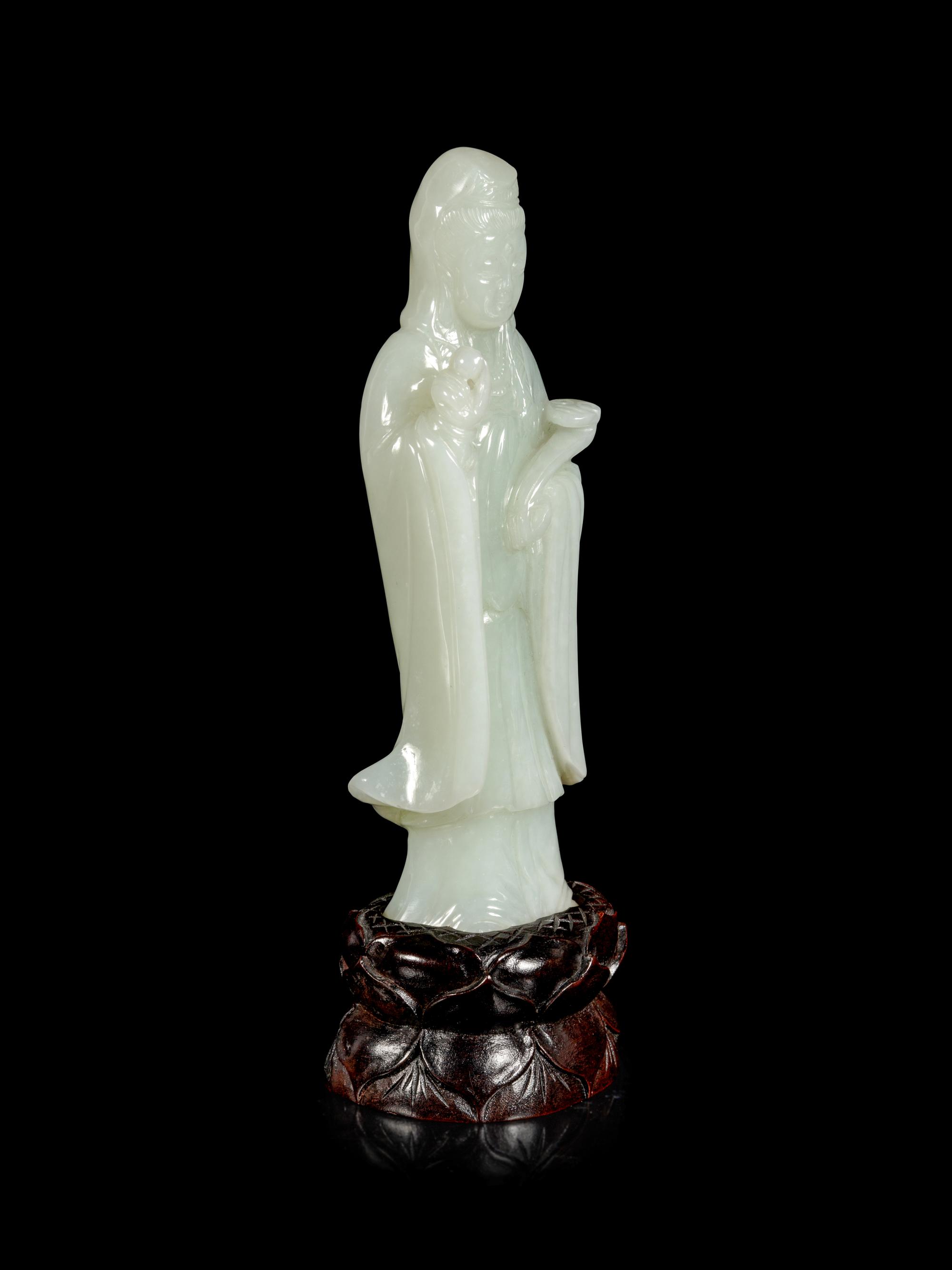 A Pale Celadon Jade Figure of Guanyin