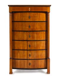 A Biedermeier Parcel Ebonized Walnut Tall Chest of Drawers