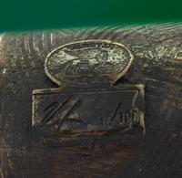 A Gilt Bronze and Glass Low Table After a Frank Gehry Design