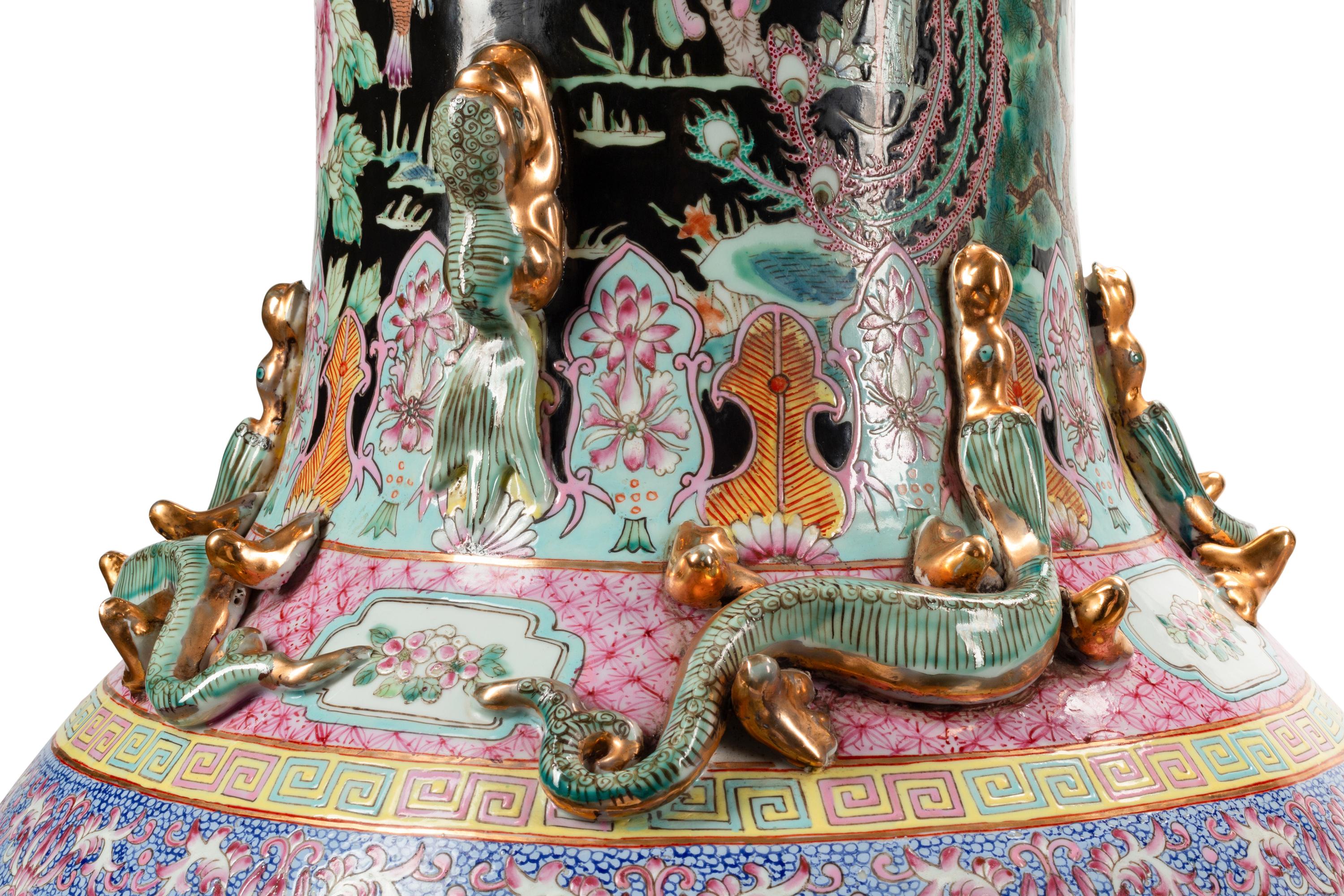 A Pair of Massive Chinese Enameled Porcelain Vases with Giltwood Stands