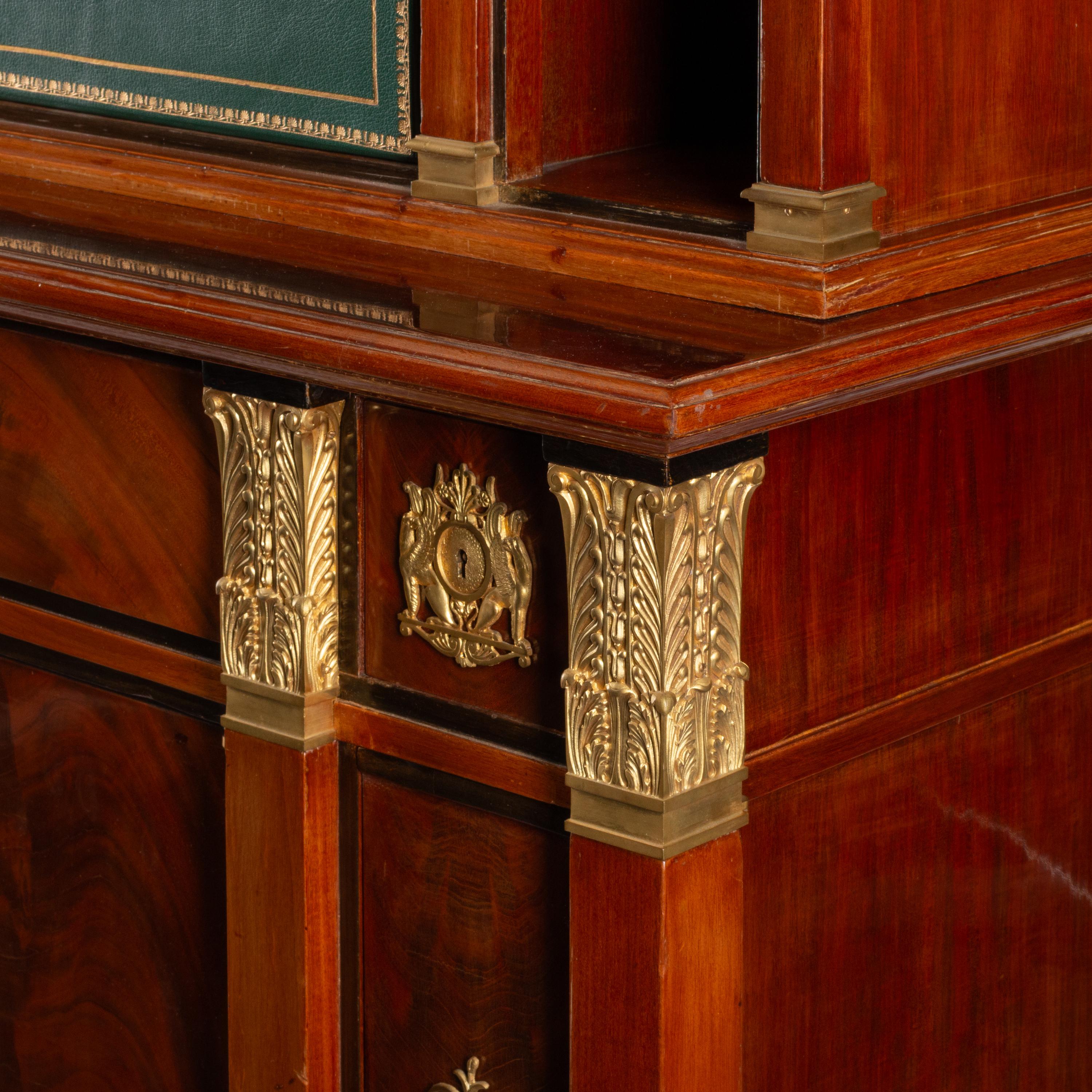 An Empire Style Gilt Bronze Mounted Mahogany Cabinet and Cartonnier