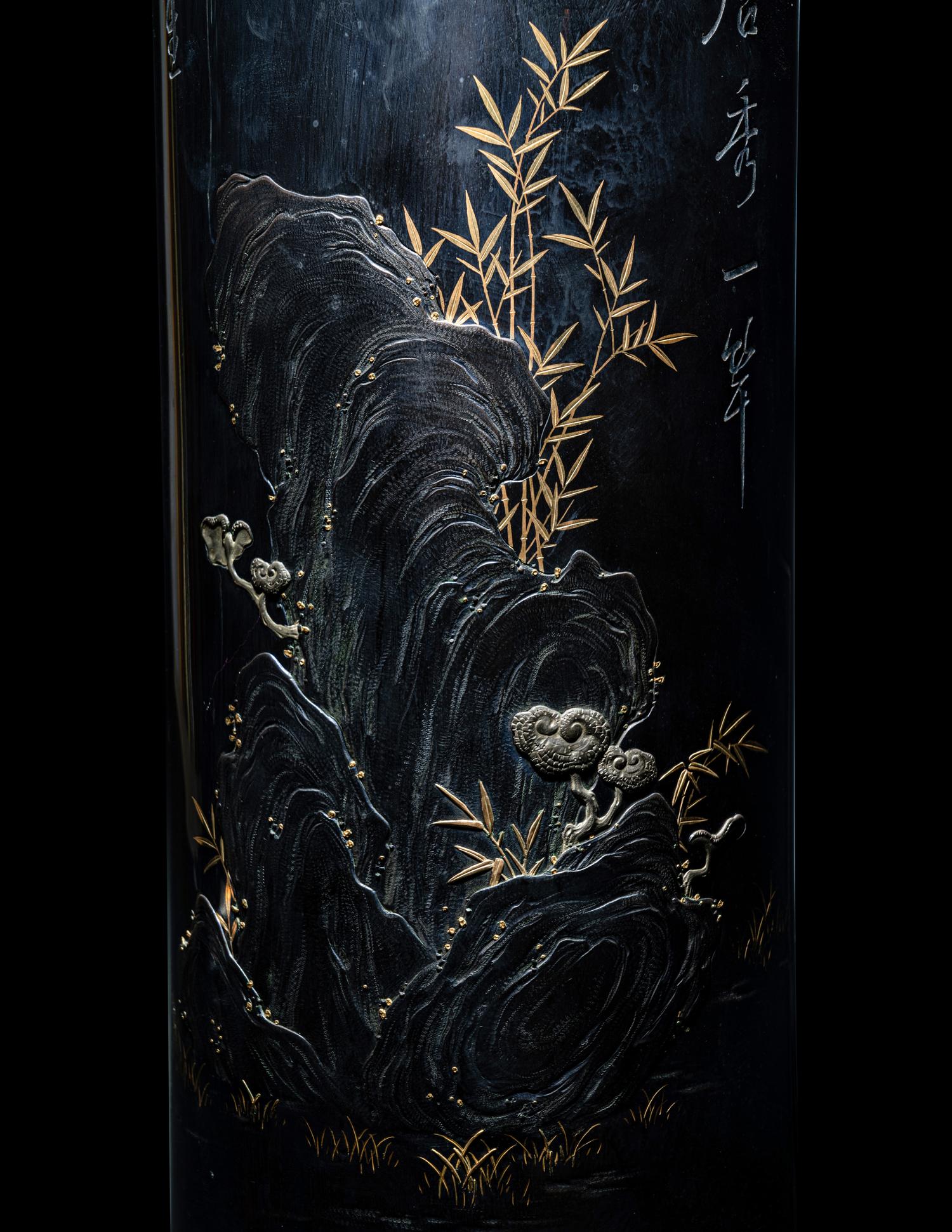 A Japanese Parcel Gilt Decorated Engraved Shakudo Flower Vase
