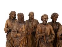 A Set of Twelve Continental Carved Walnut Figures of Apostles
