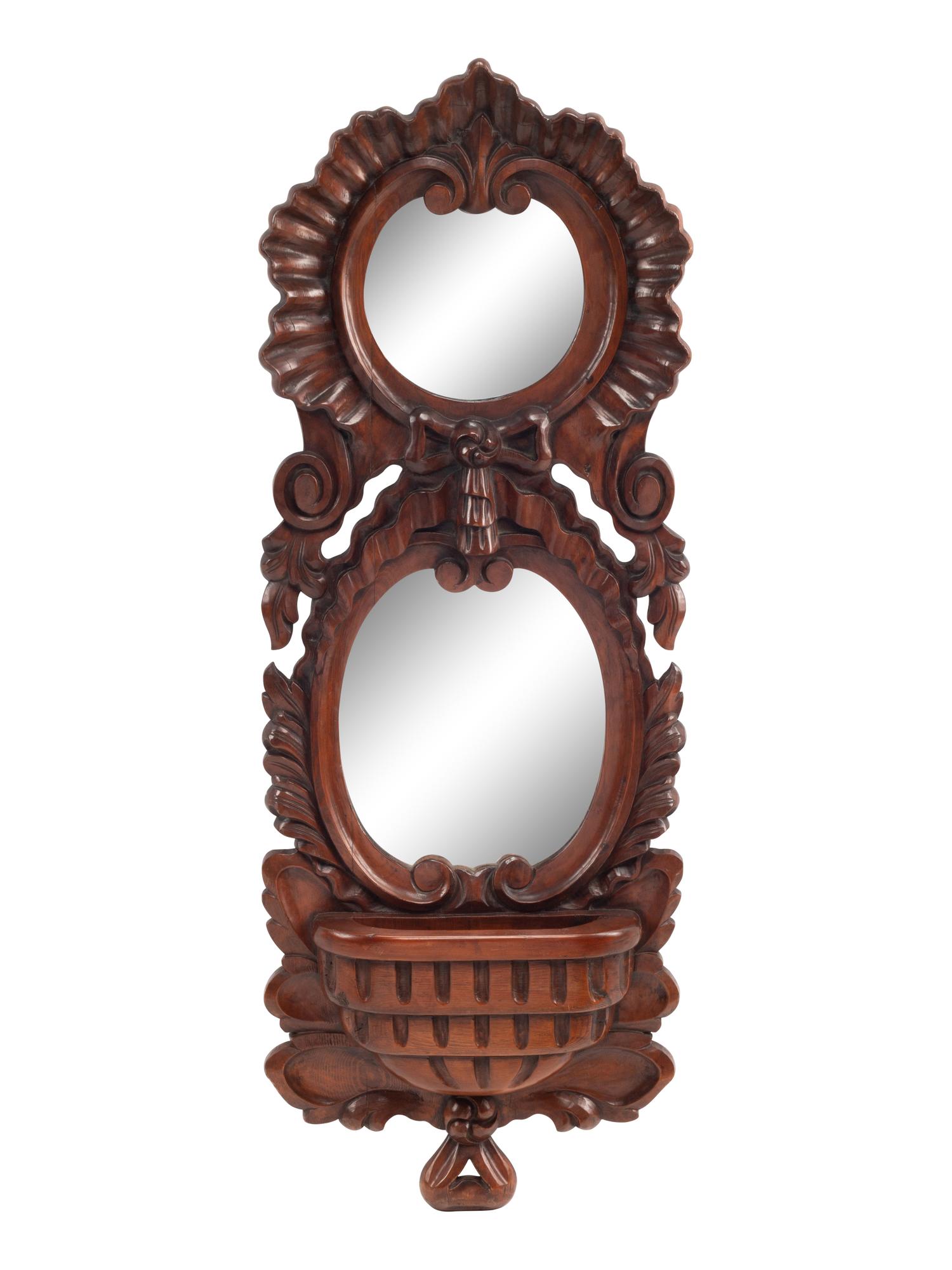 A Continental Carved Walnut Mirror and Wall Pocket