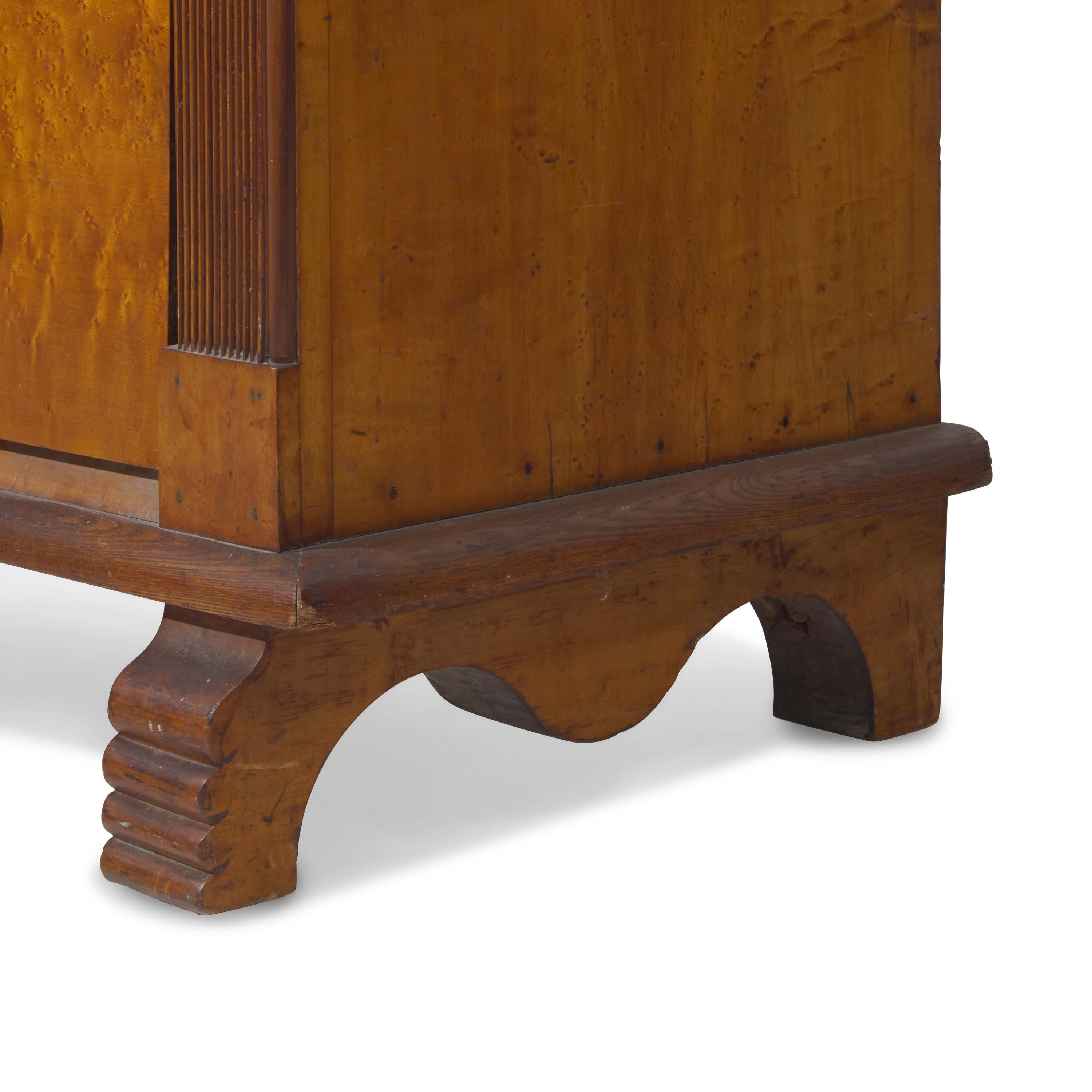 A Late Classical Bird’s Eye Maple Tall Chest of Drawers