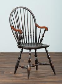 A D.R. Dimes Black-Painted Brace-Back Compass-Seat Windsor Armchair