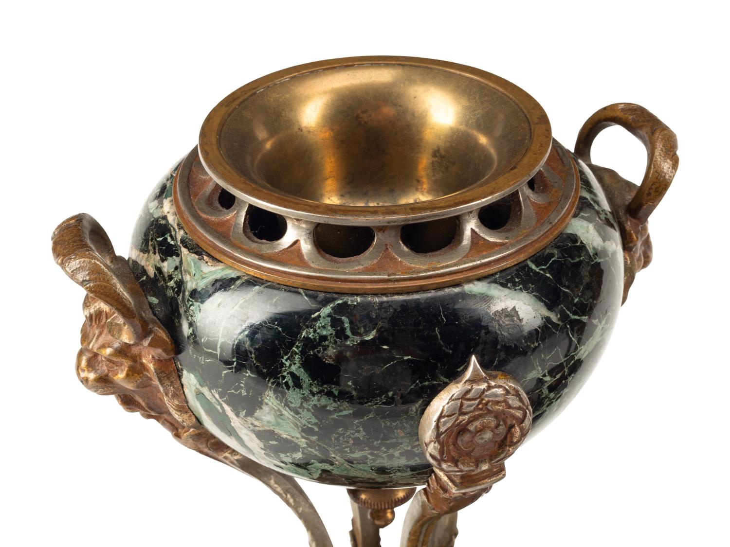 A French Bronze and Marble Clock Garniture