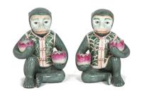 A Pair of Chinese Polychrome Glazed Ceramic Seated Monkey-Form Candleholders Height 7 1/4 inches. — 20TH CENTURY