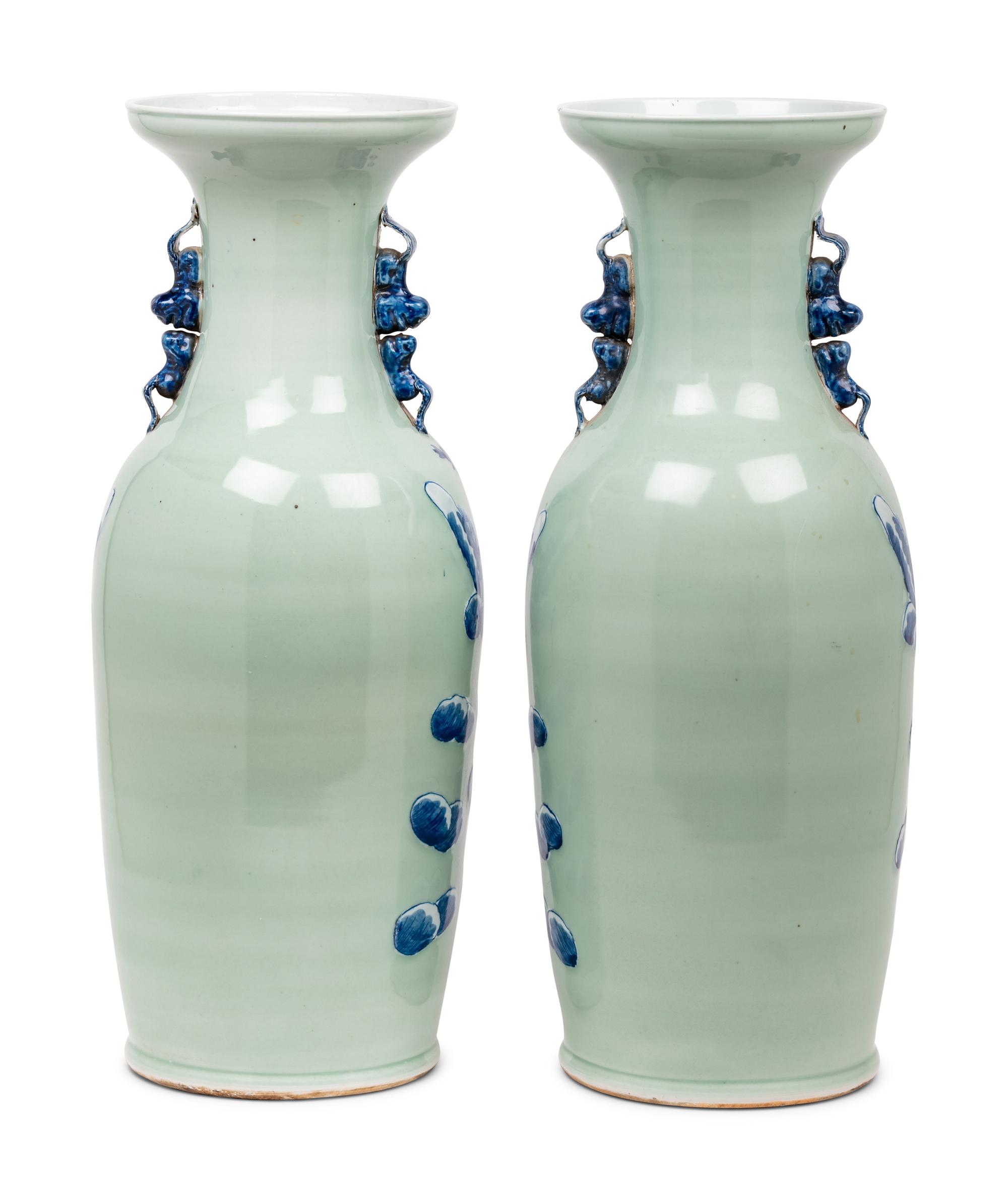 A Pair of Celadon Ground Underglaze Blue Porcelain 'Eight Immortals' Baluster Vases