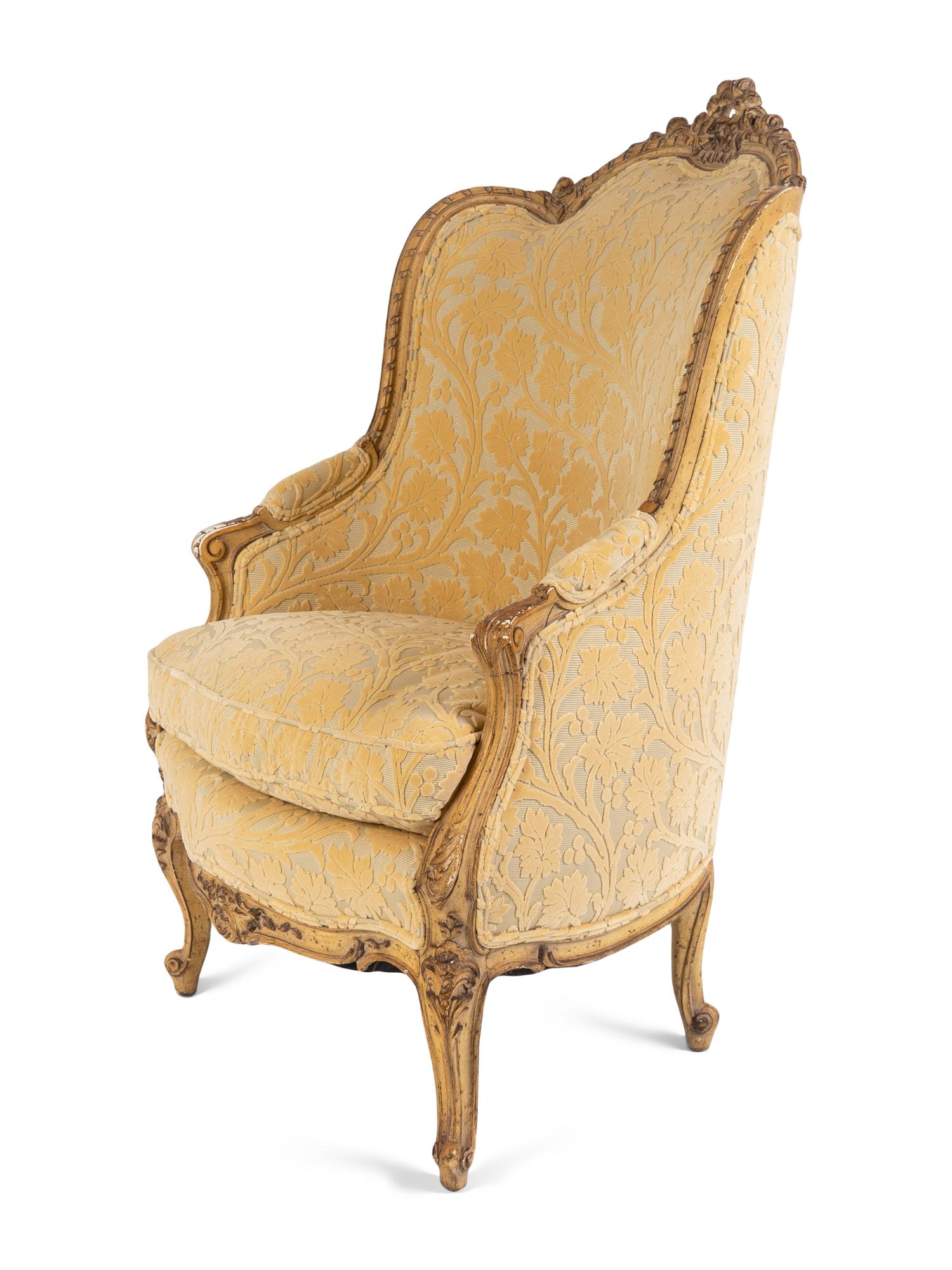 A Louis XV Style Carved and Painted Bergere A Oreille — 19TH CENTURY