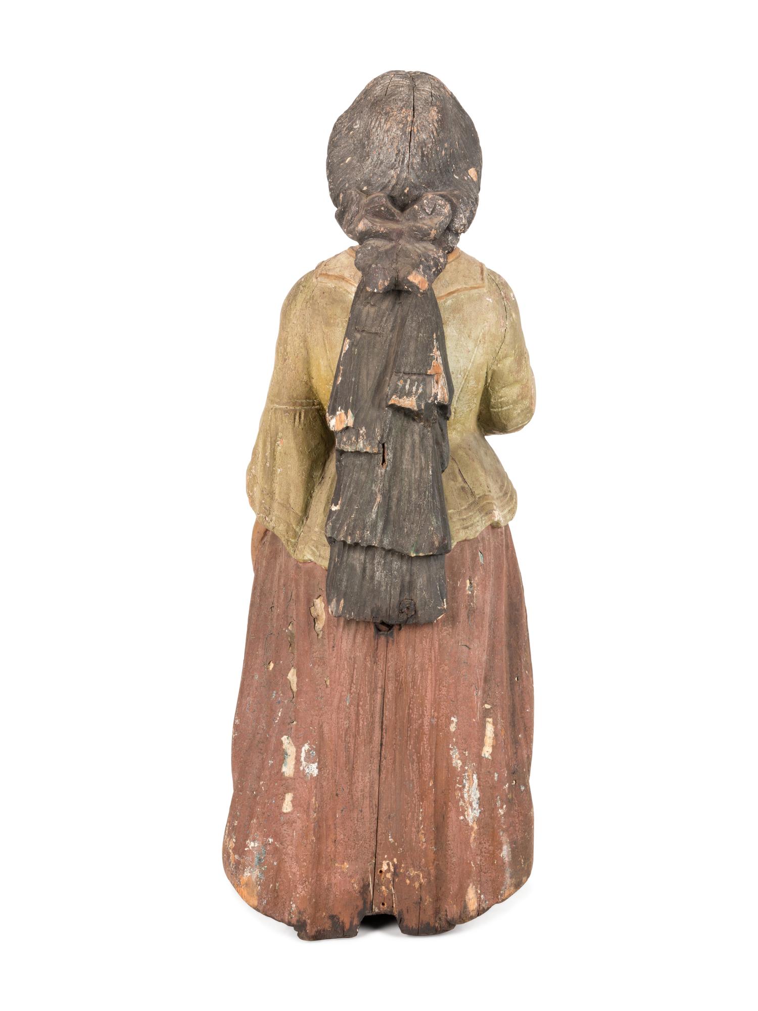 An American Carved and Painted Wood Female Figurehead for a Ship