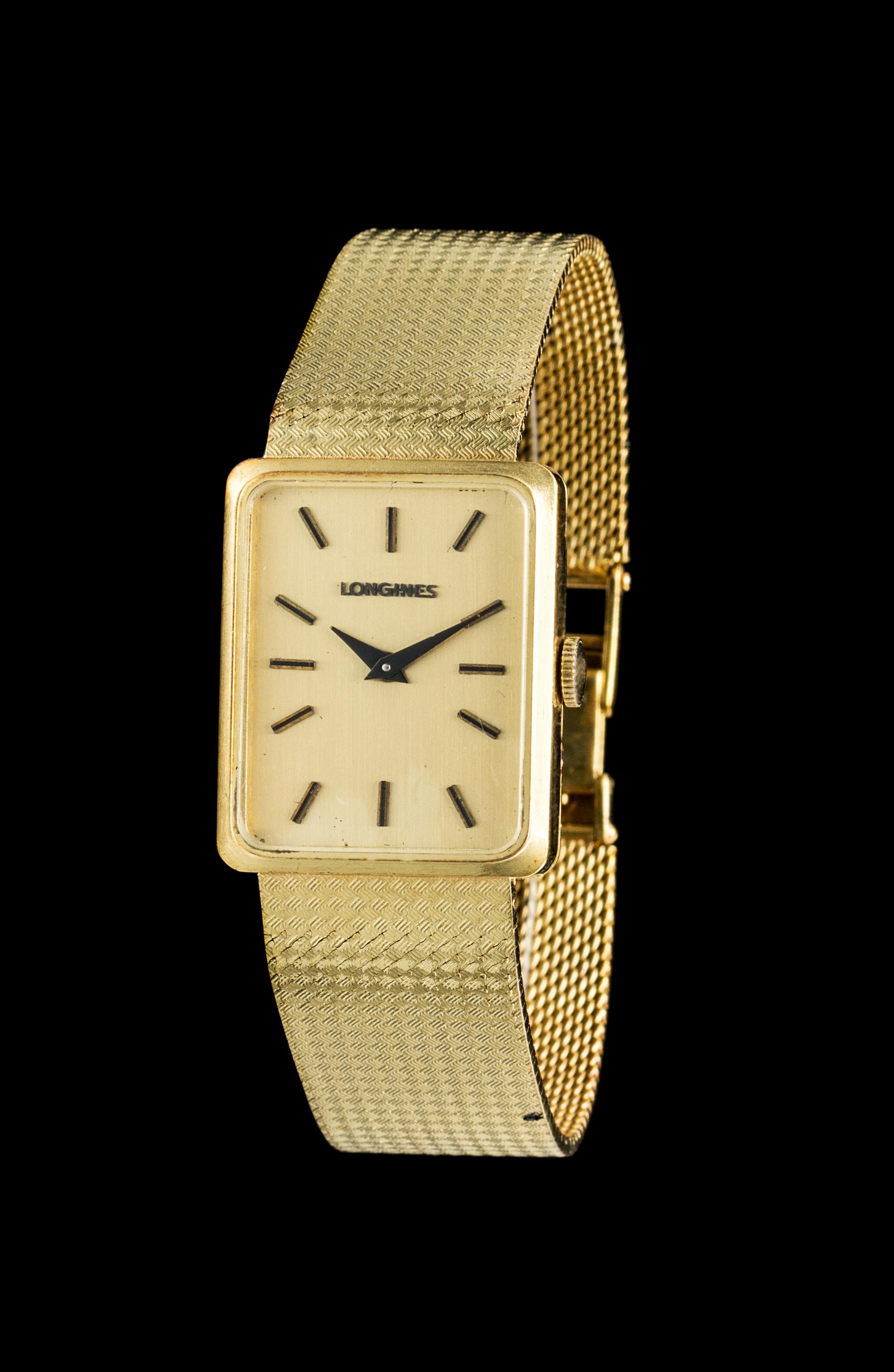 A 14 Karat Yellow Gold Wristwatch, Longines,