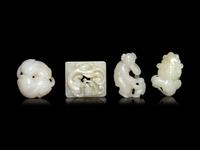 Four Chinese Pale Celadon and White Jade Carvings