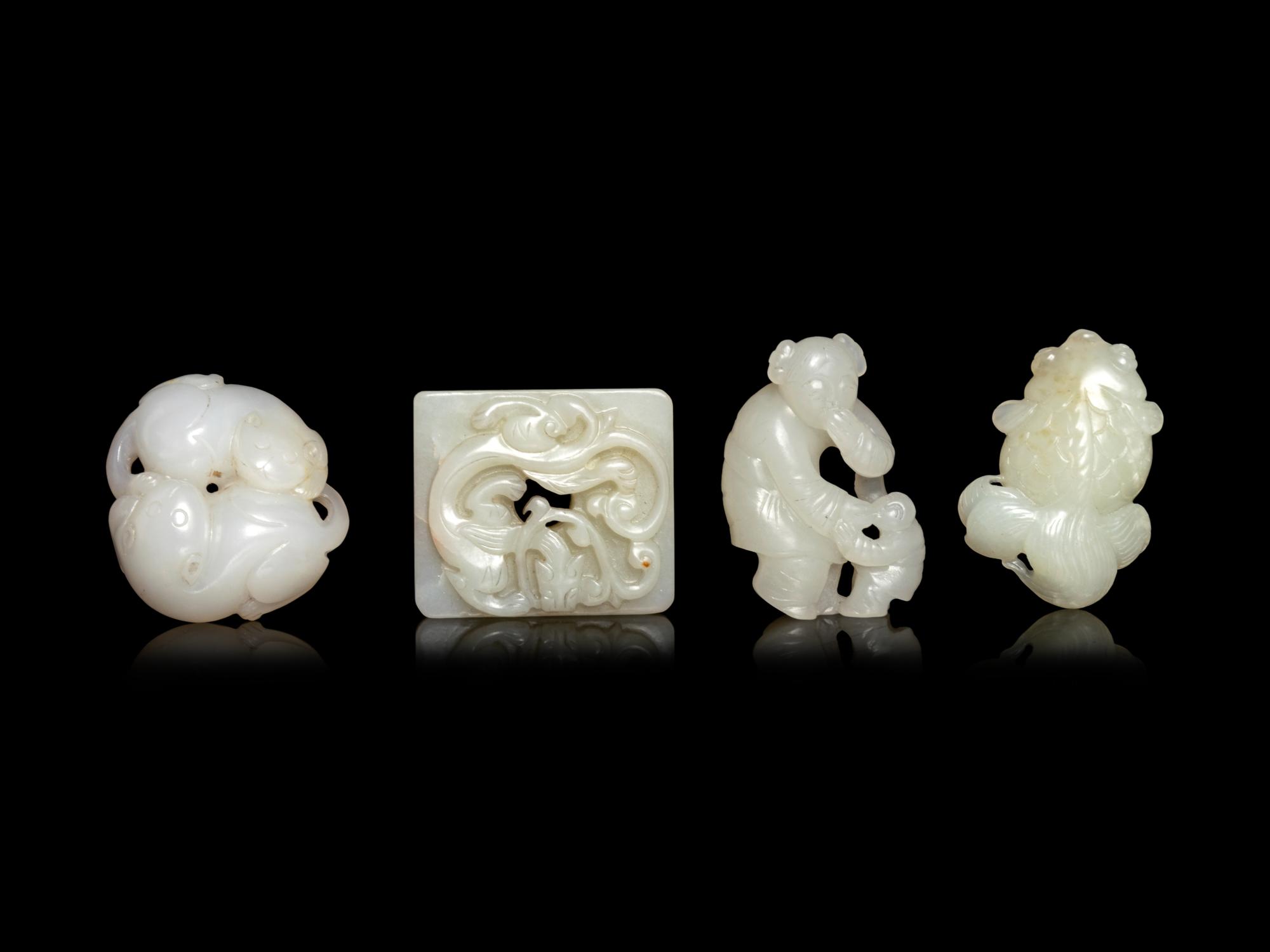 Four Chinese Pale Celadon and White Jade Carvings