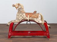 A Carved and Painted Wood Child's Riding Horse Toy